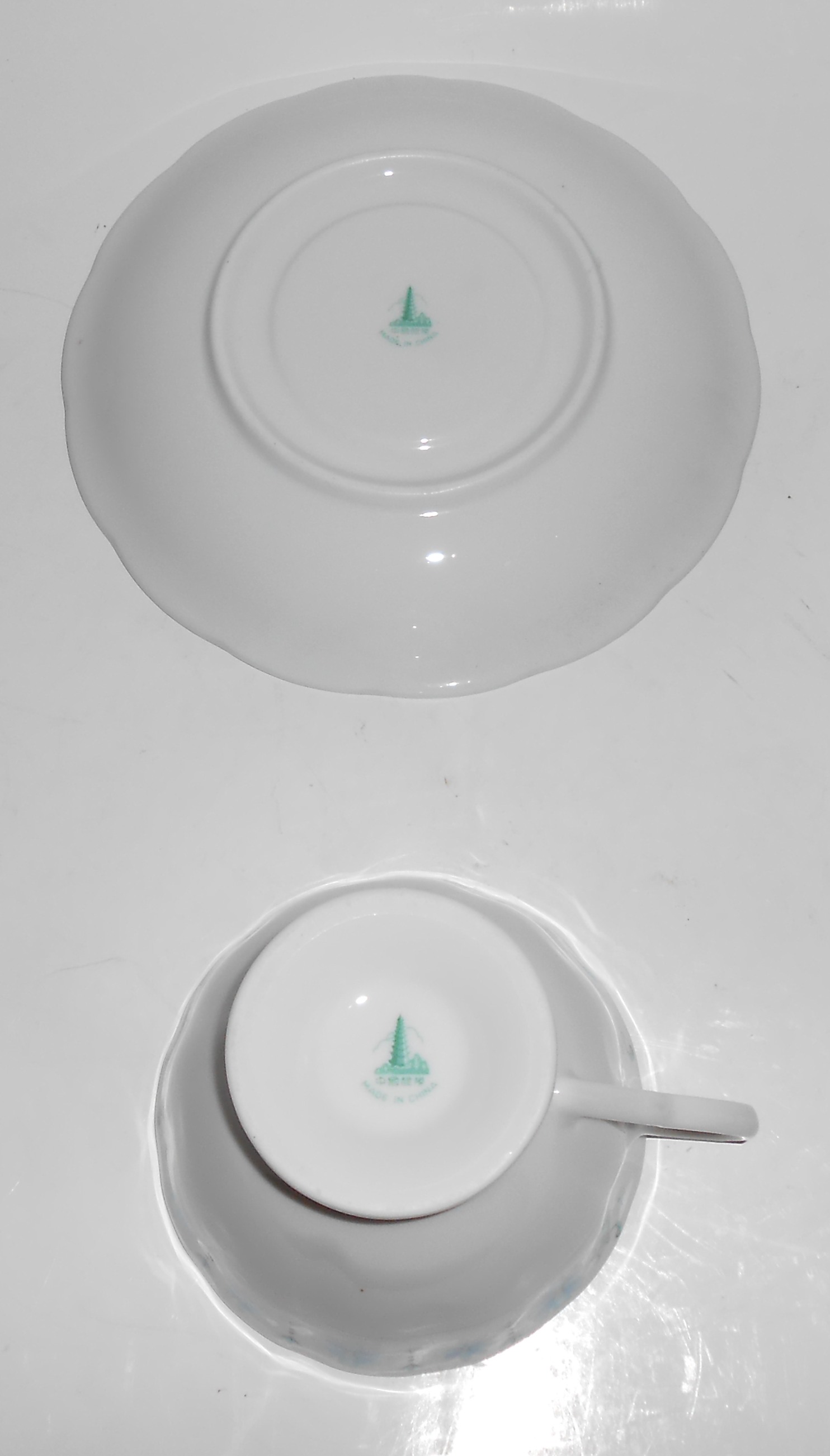 Made In China Blue Floral Porcelain Cup & Saucer Set
