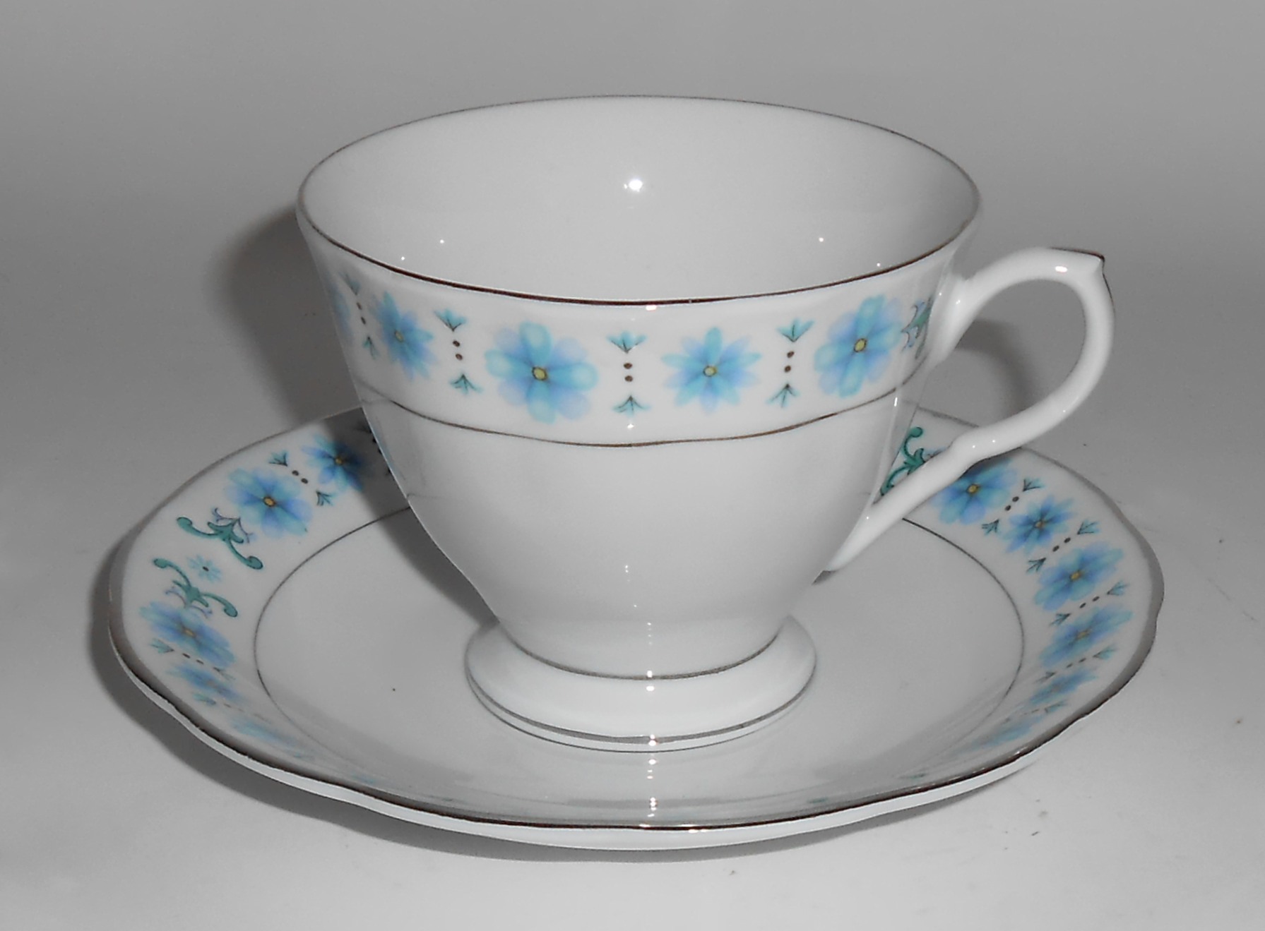 Made In China Blue Floral Porcelain Cup & Saucer Set