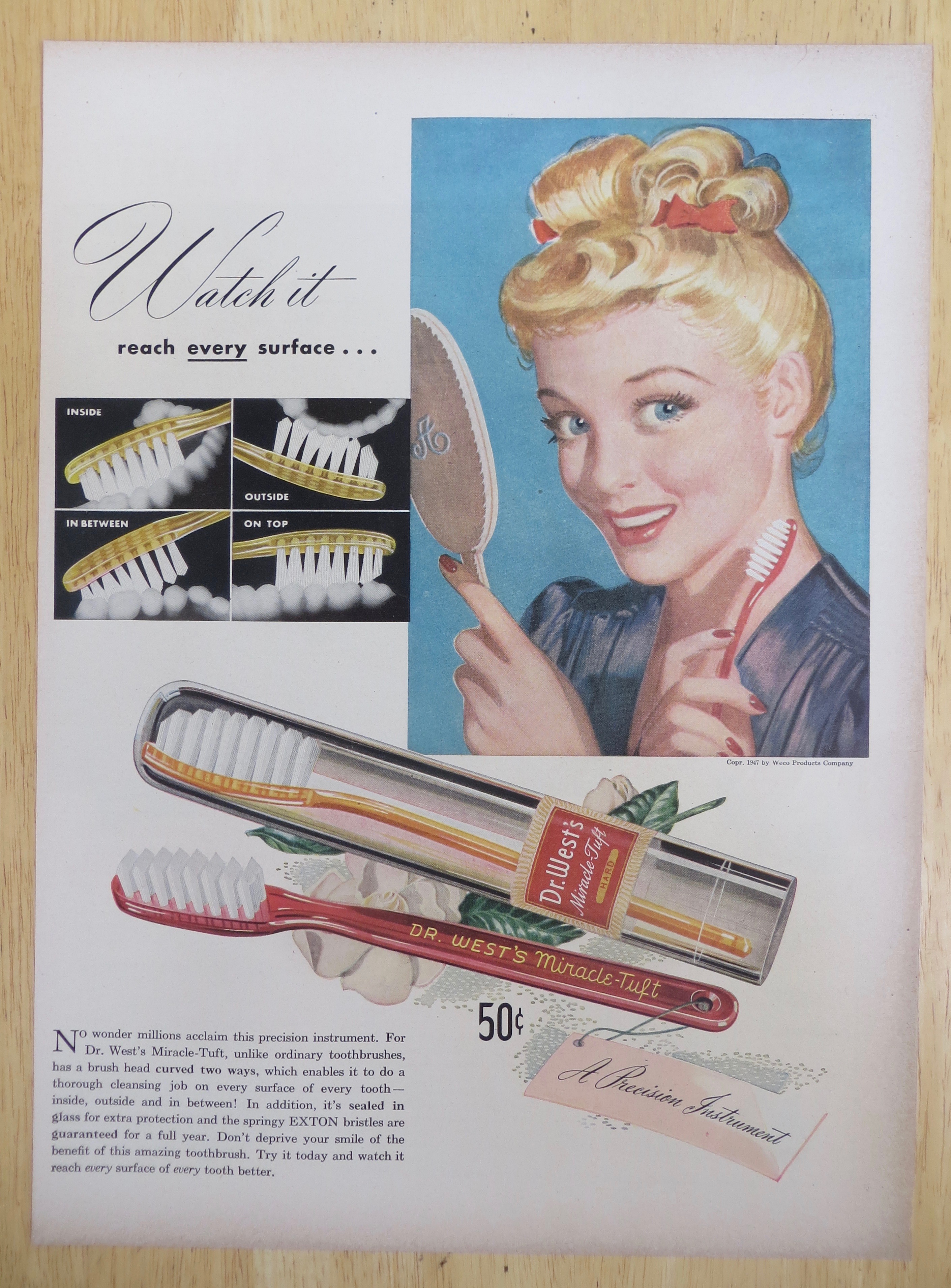1947 Dr. West Toothbrushes with Woman Smiling in Mirror