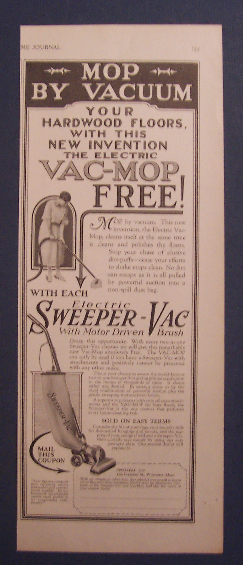 1923 Electric Sweeper-Vac with Woman Using Vacuum