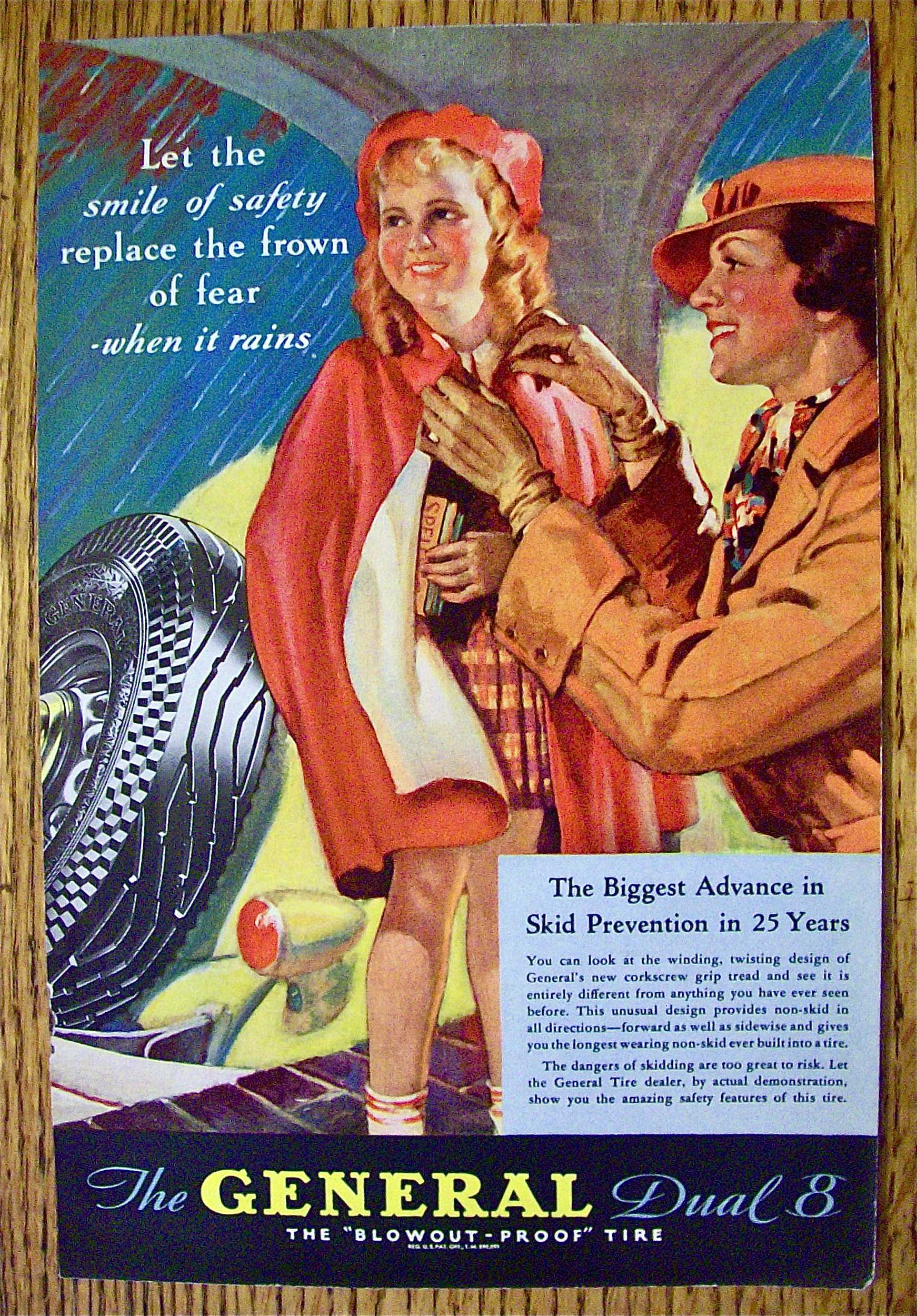 1935 General Tire with Woman Tying Girl's Poncho