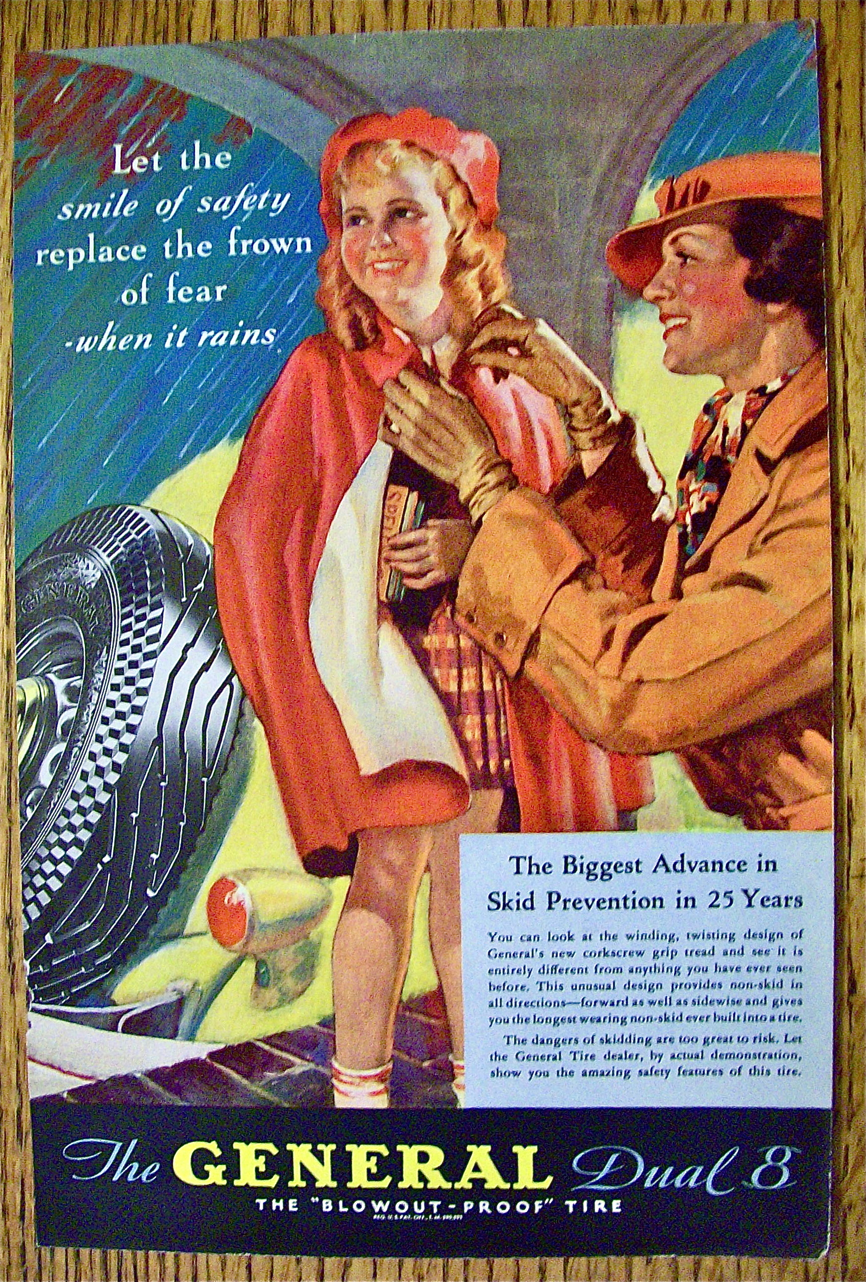 1935 General Tire with Woman Tying Girl's Poncho
