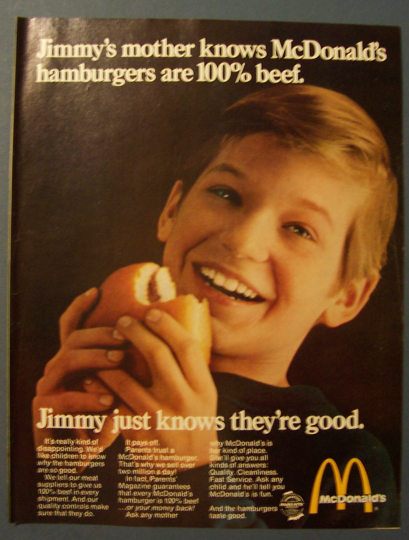 1969 Mc Donald's Restaurant with Boy Eating Hamburger