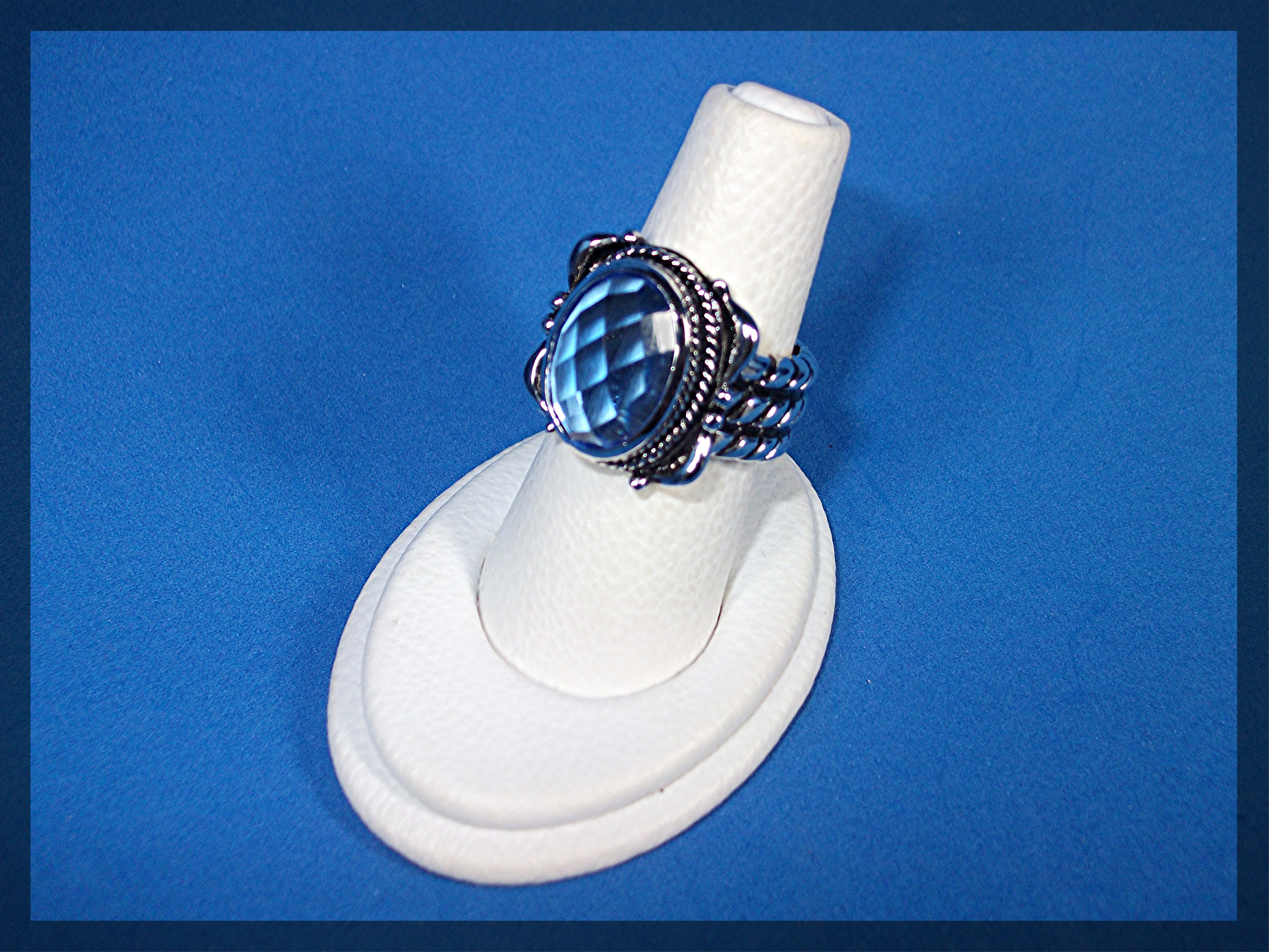 Ring Sterling Silver Faceted Blue Topaz Rope Shank