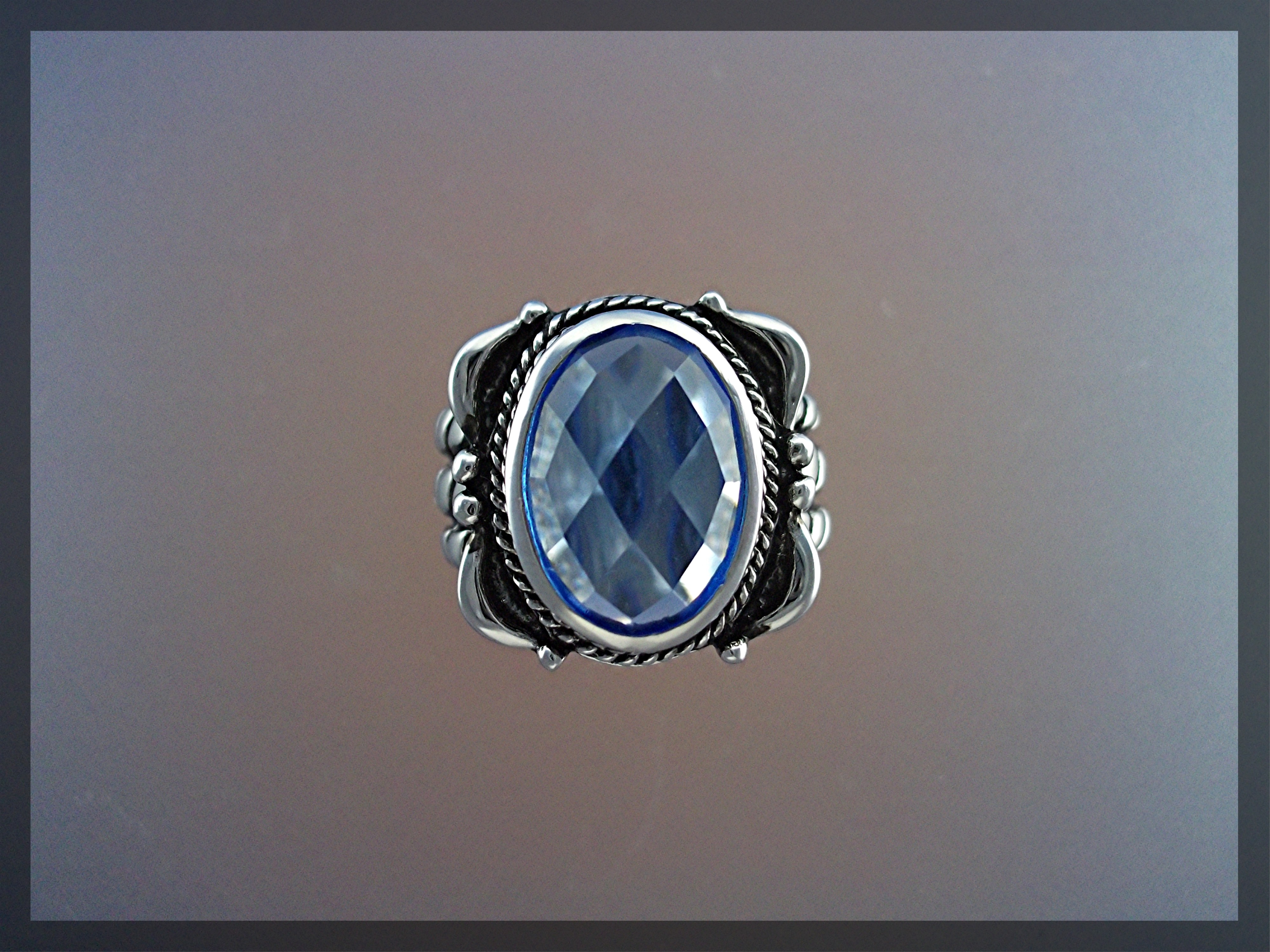 Ring Sterling Silver Faceted Blue Topaz Rope Shank