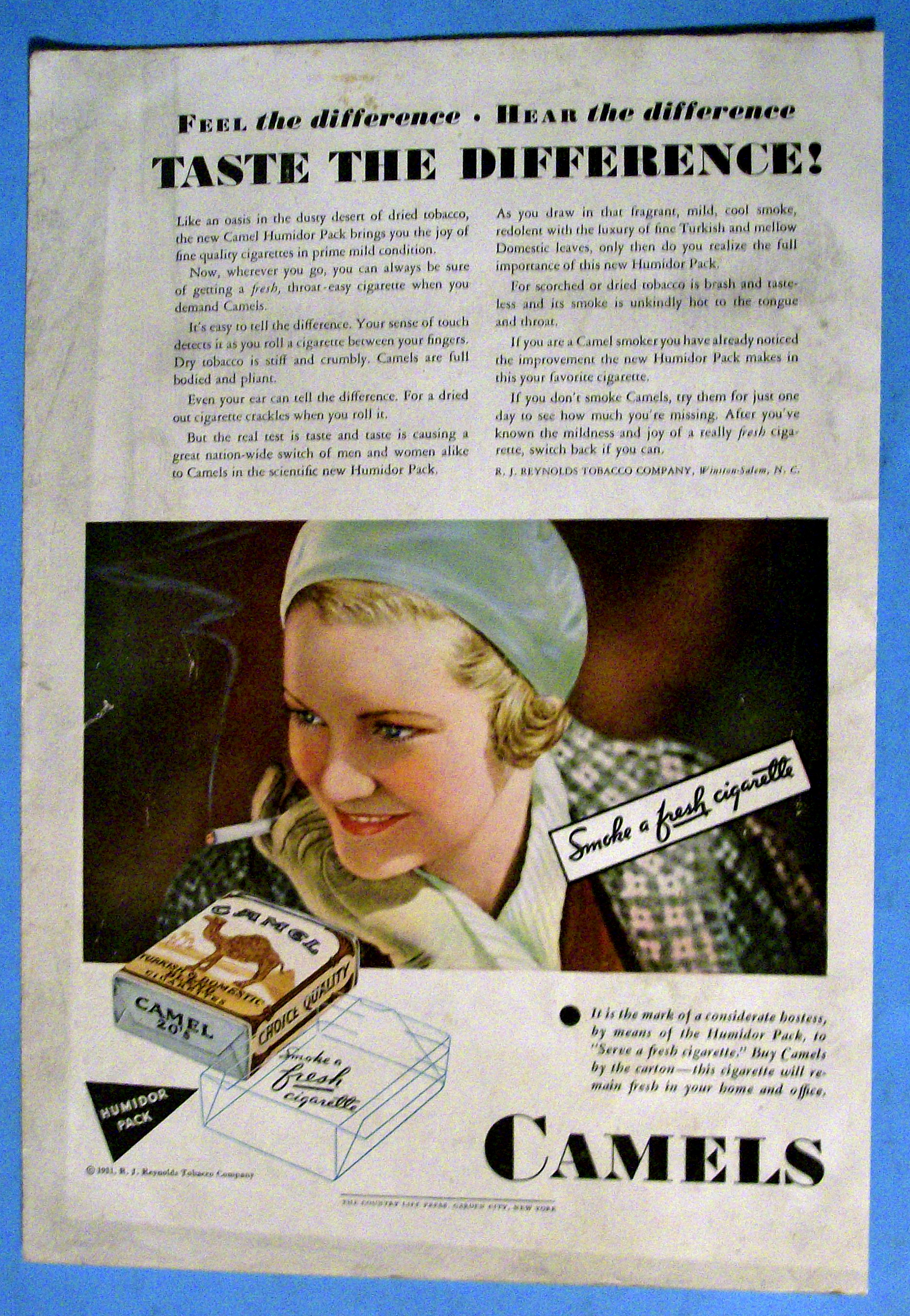 1931 Camel Cigarettes with a Woman Smoking A Cigarette