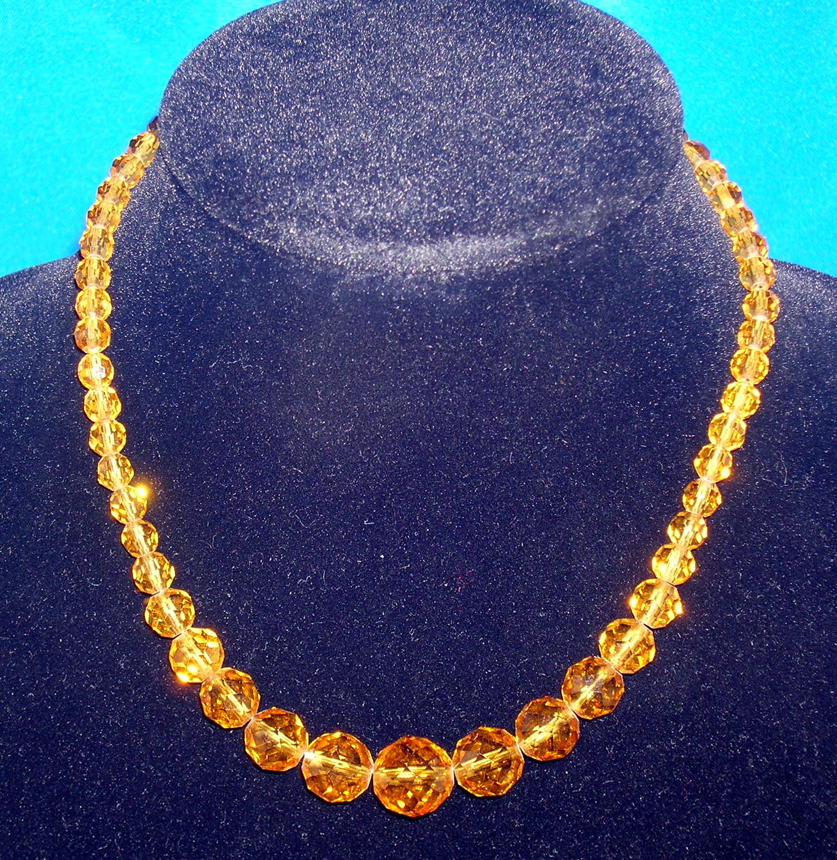Faceted Graduated Golden Amber Glass Beads