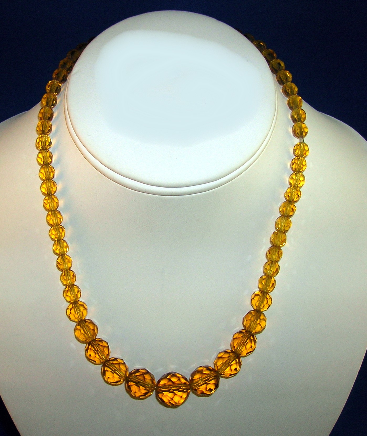 Faceted Graduated Golden Amber Glass Beads