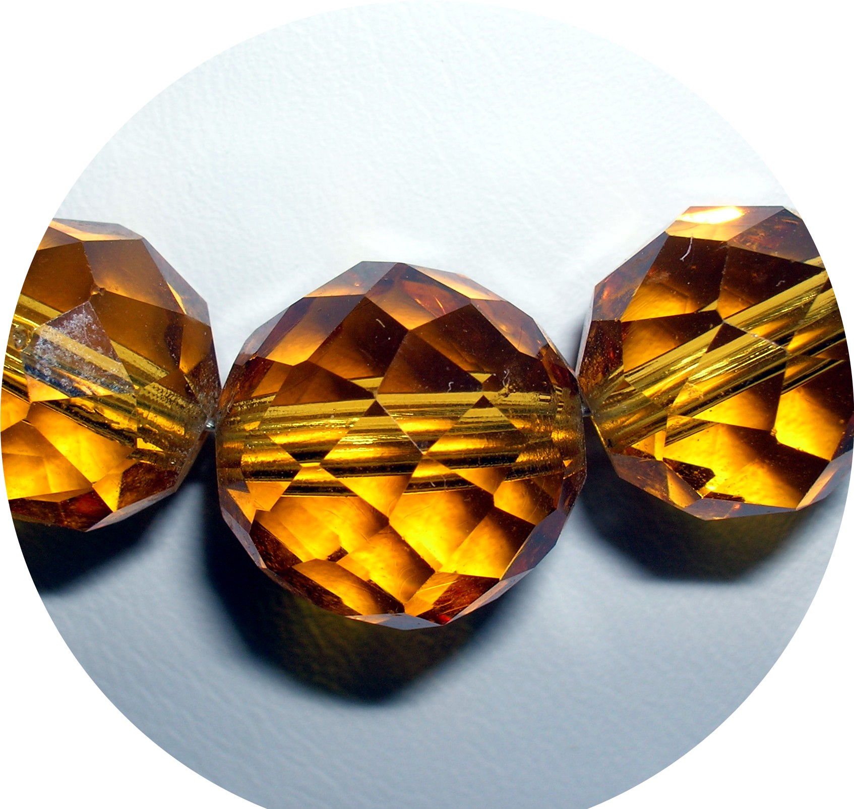 Faceted Graduated Golden Amber Glass Beads