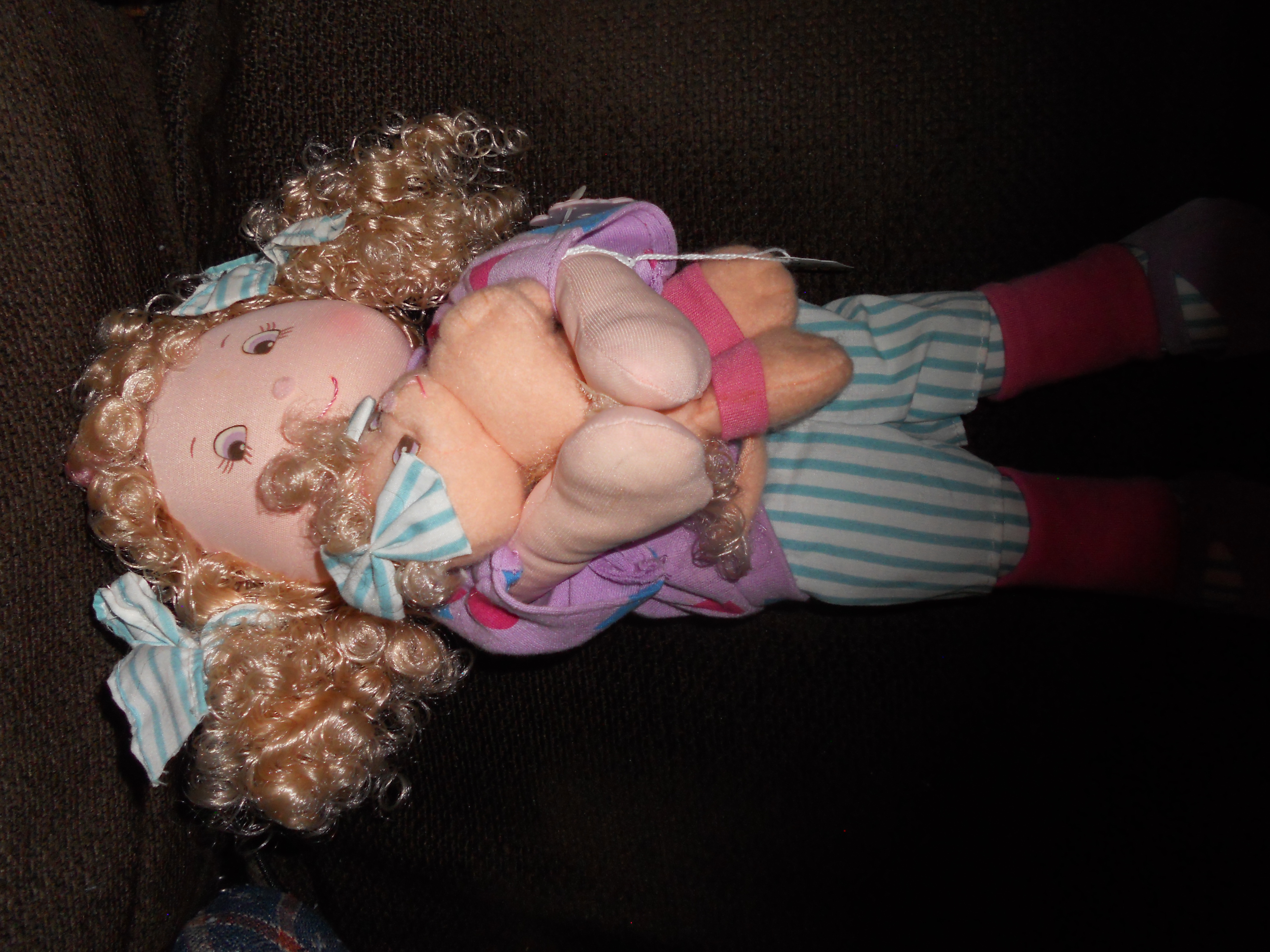 Cloth Doll Holding Kitty, Applause