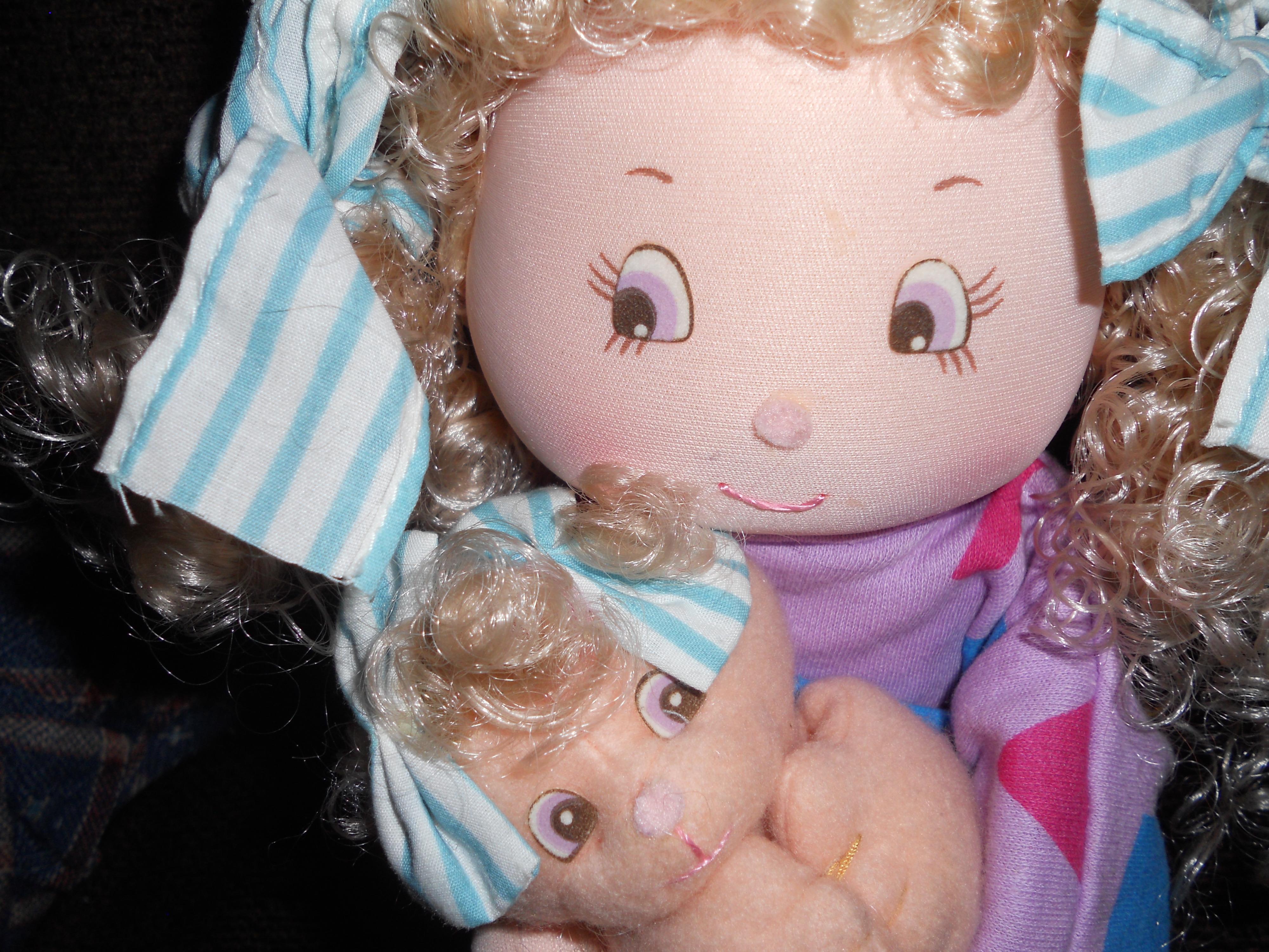 Cloth Doll Holding Kitty, Applause