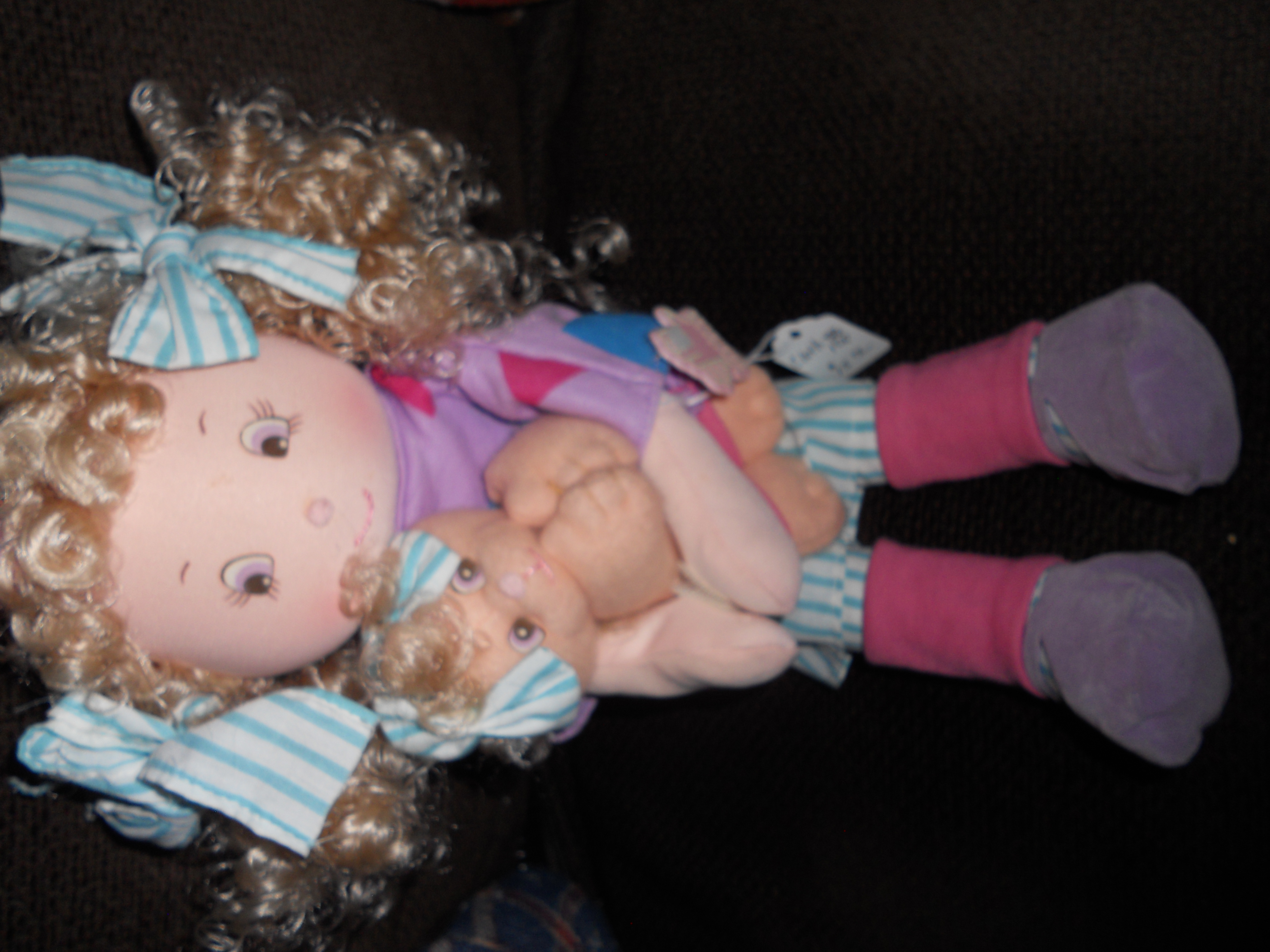 Cloth Doll Holding Kitty, Applause
