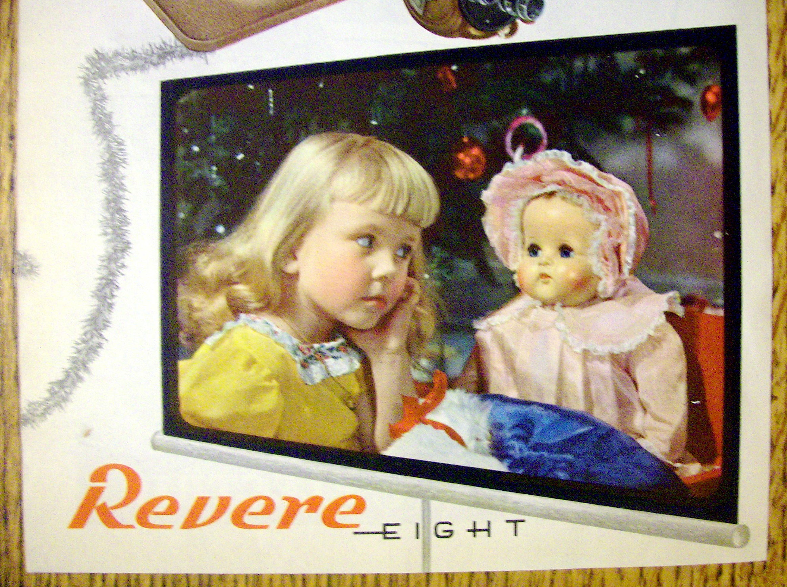 1946 Revere Eight Projector with Little Girl & Her Doll
