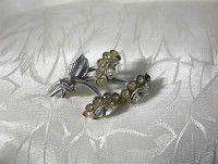 Rhodium Silvertone rhinestone flower brooch