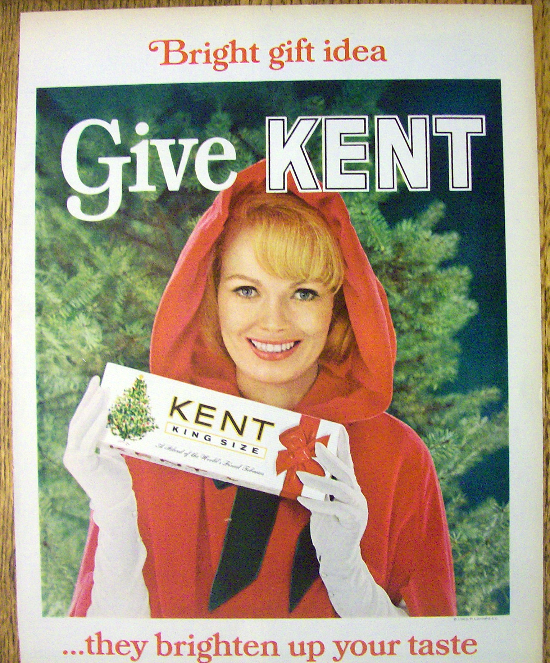 1965 Kent Cigarettes with Woman Holding a Carton