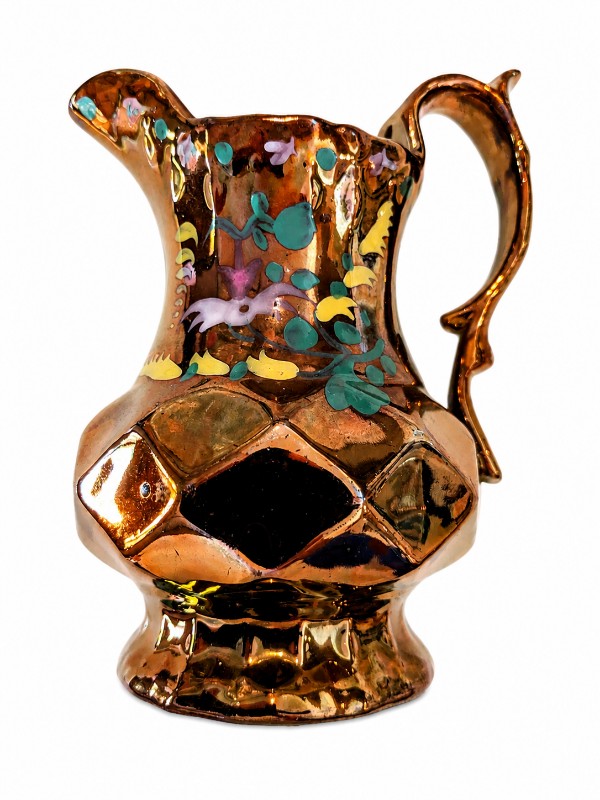 32 copper lusterware pitcher left