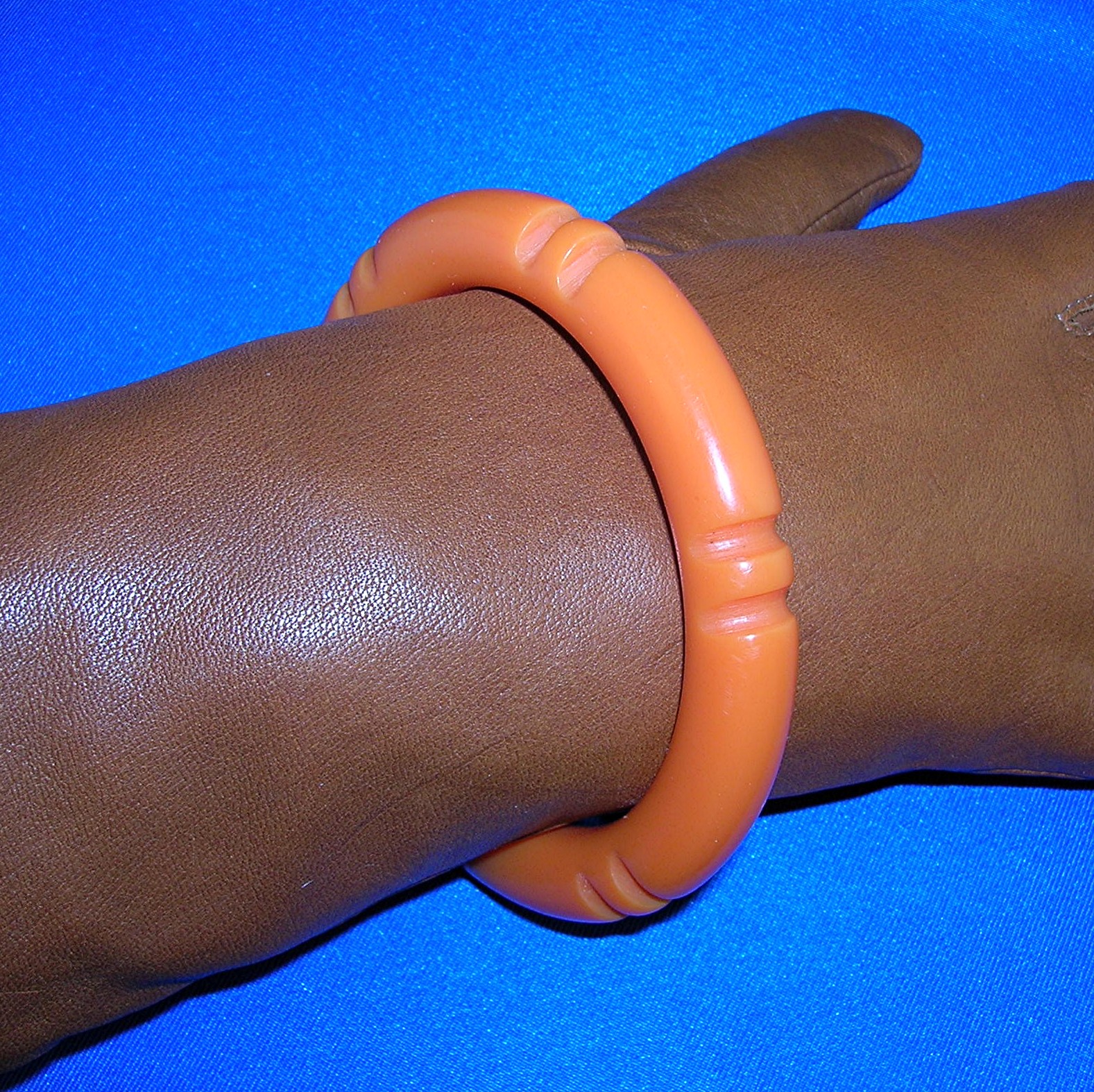Bakelite Tangerine Carved Bangle bracelet