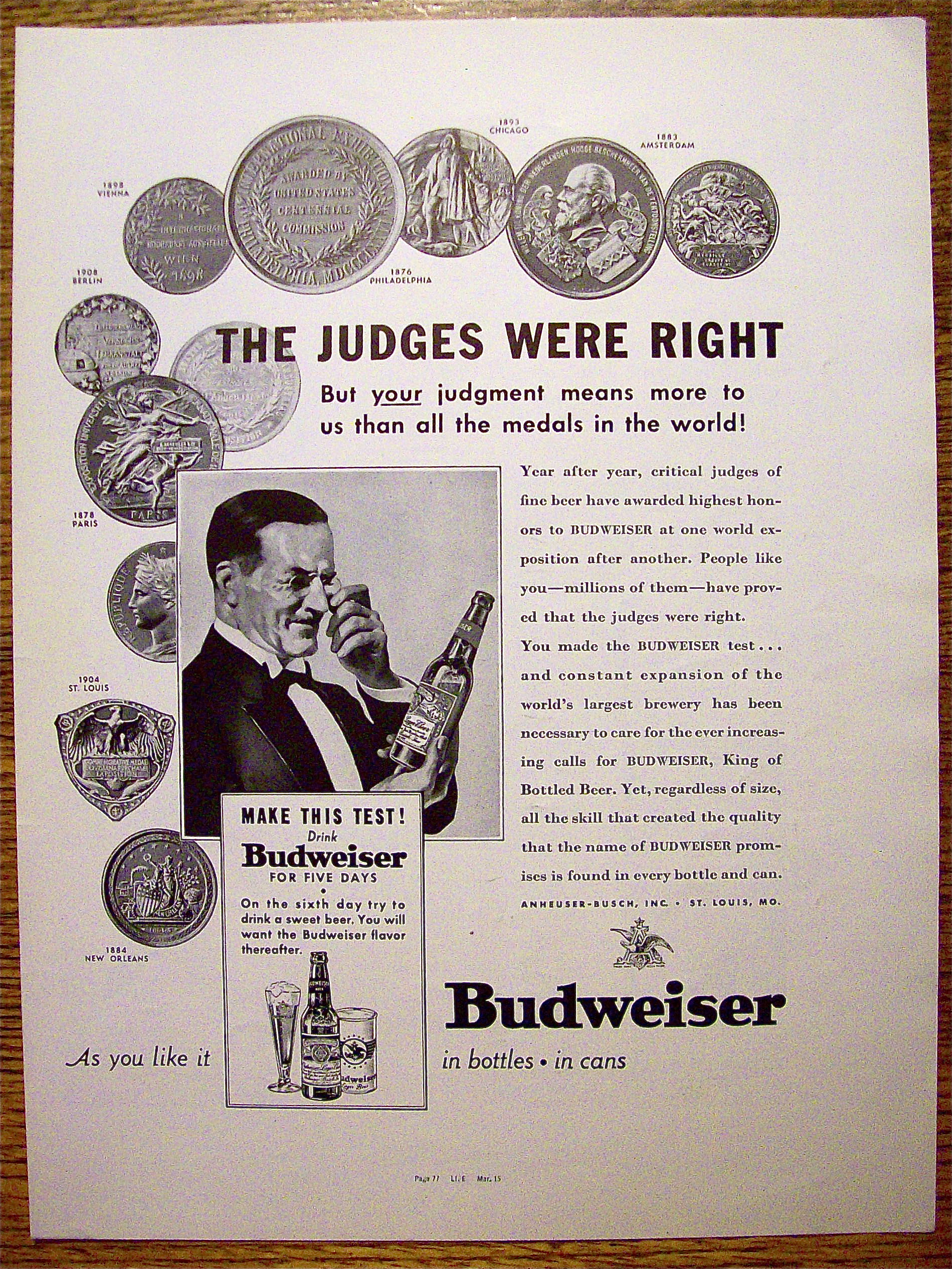 1937 Budweiser Beer with Man Looking at Bottle of Beer