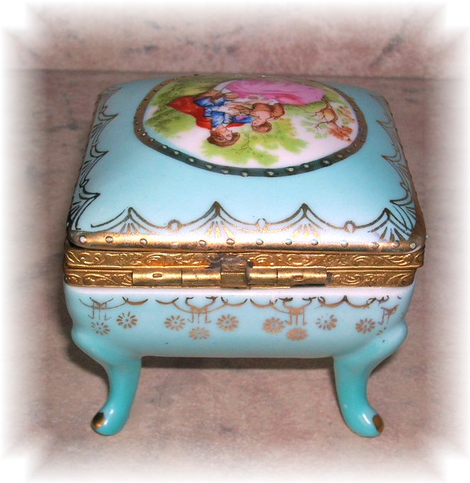 Exqusite Hand Painted Porcelain Trinket Box..