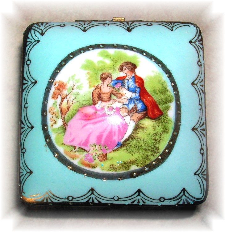 Exqusite Hand Painted Porcelain Trinket Box..