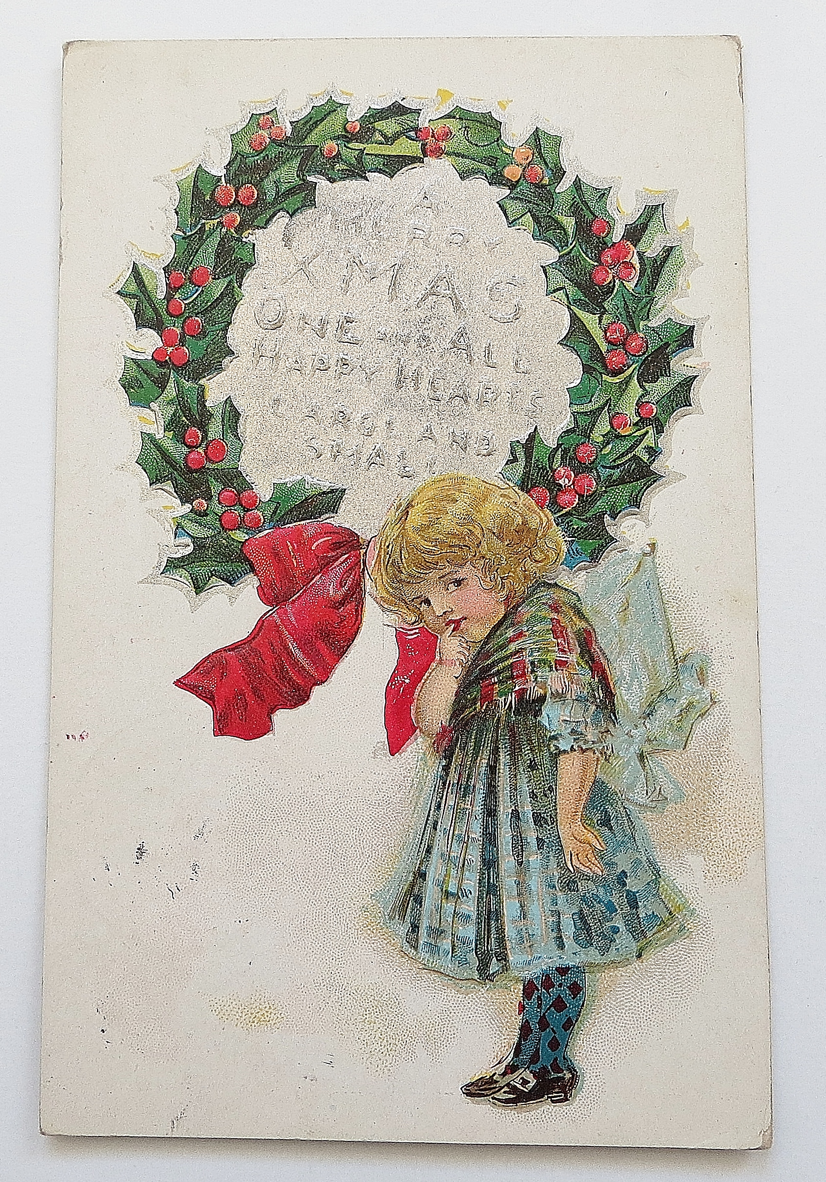 Little Girl By Christmas Wreath