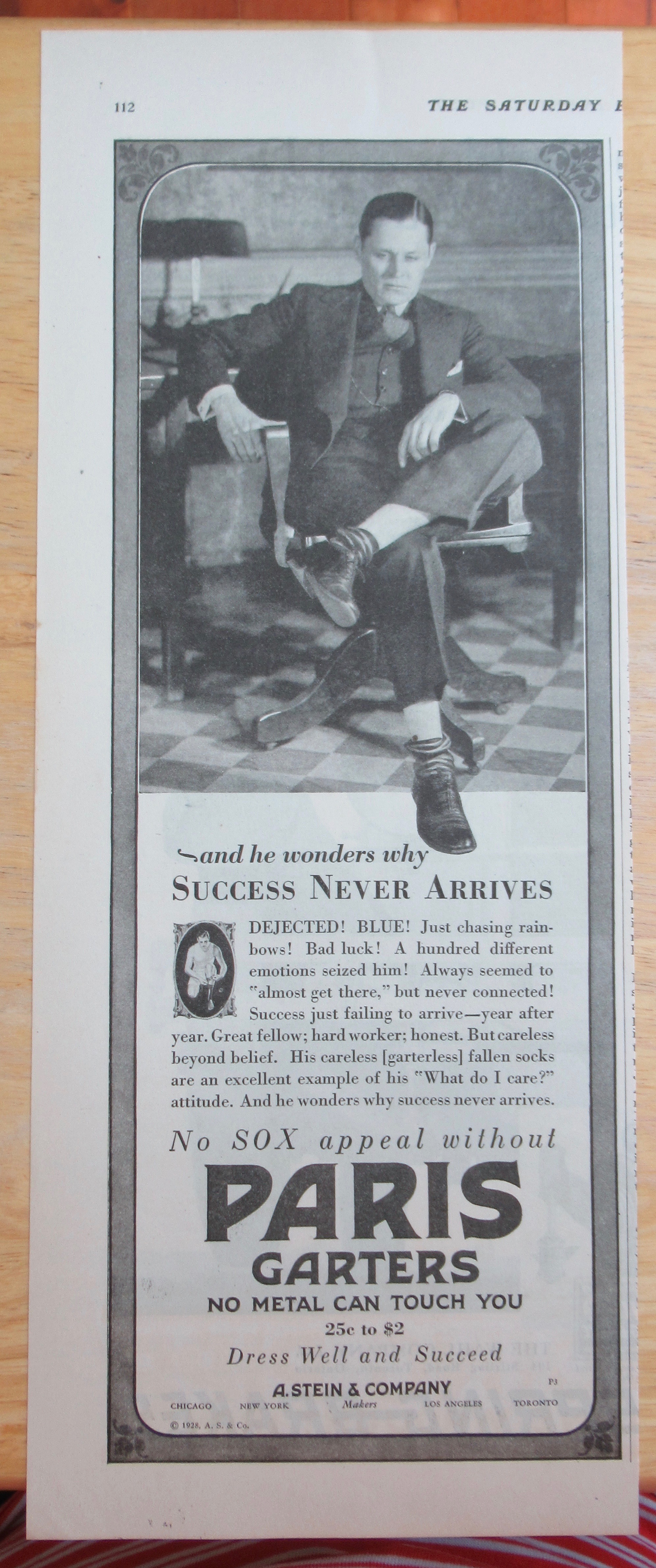 1928 Paris Garters with Man Sitting in a Chair