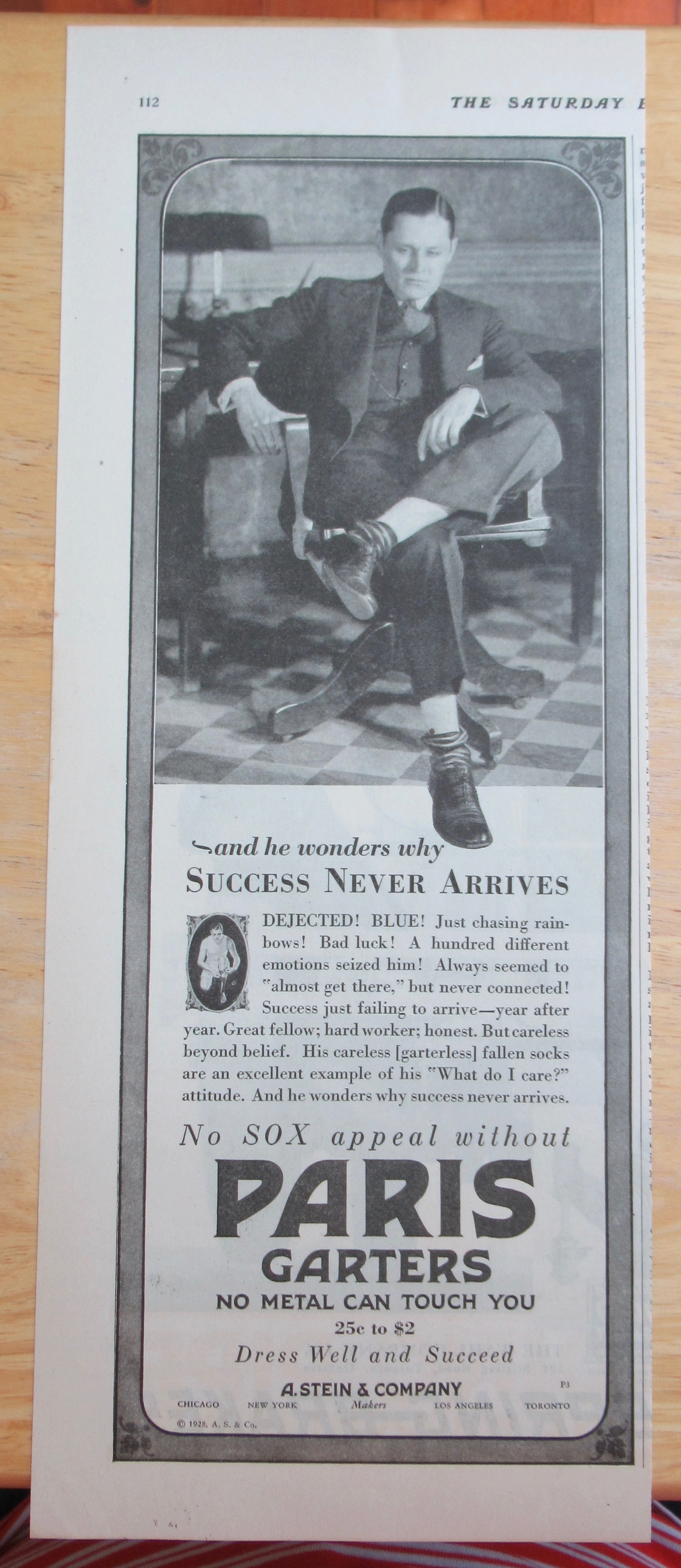 1928 Paris Garters with Man Sitting in a Chair