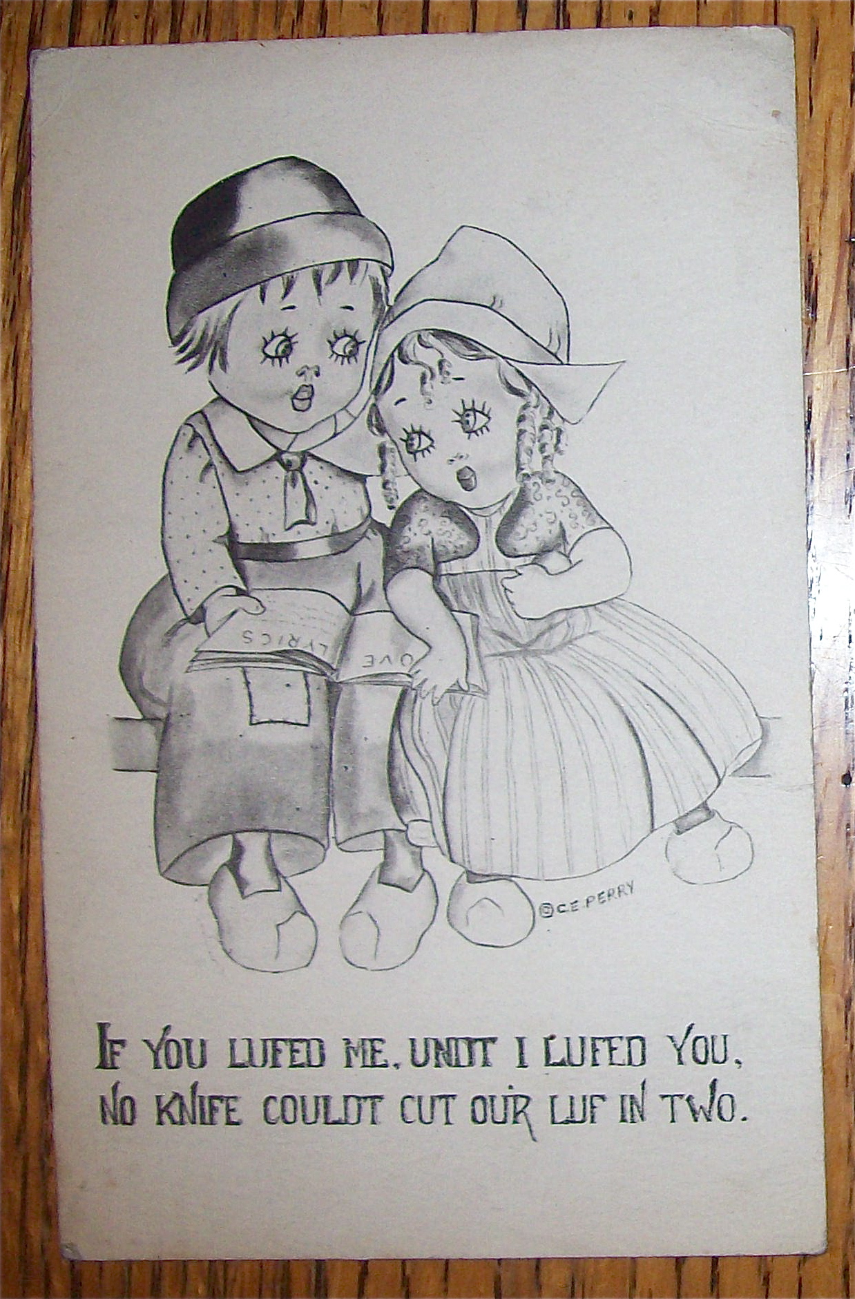 Dutch Boy And Girl Sitting Next To Each Other Postcard