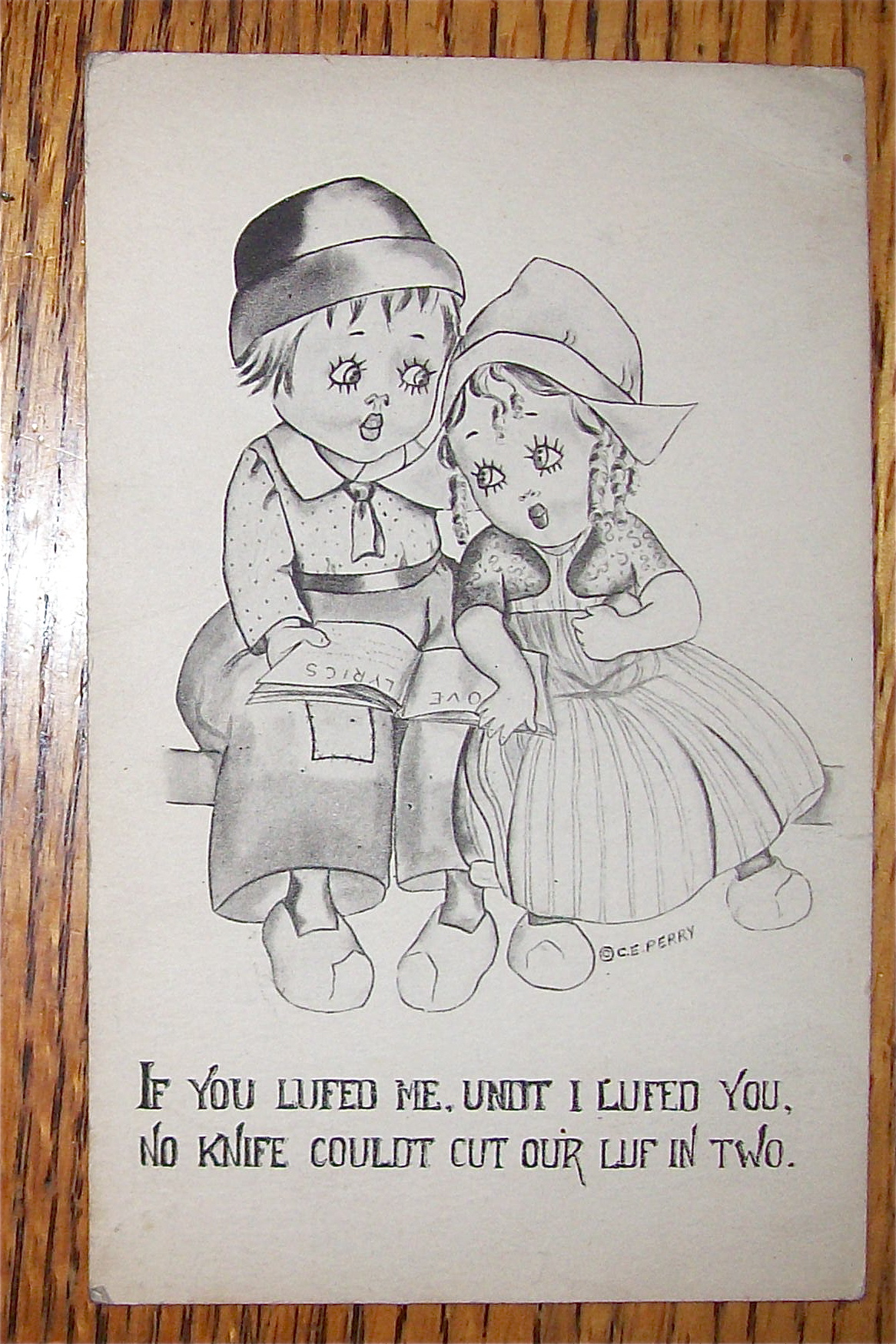 Dutch Boy And Girl Sitting Next To Each Other Postcard