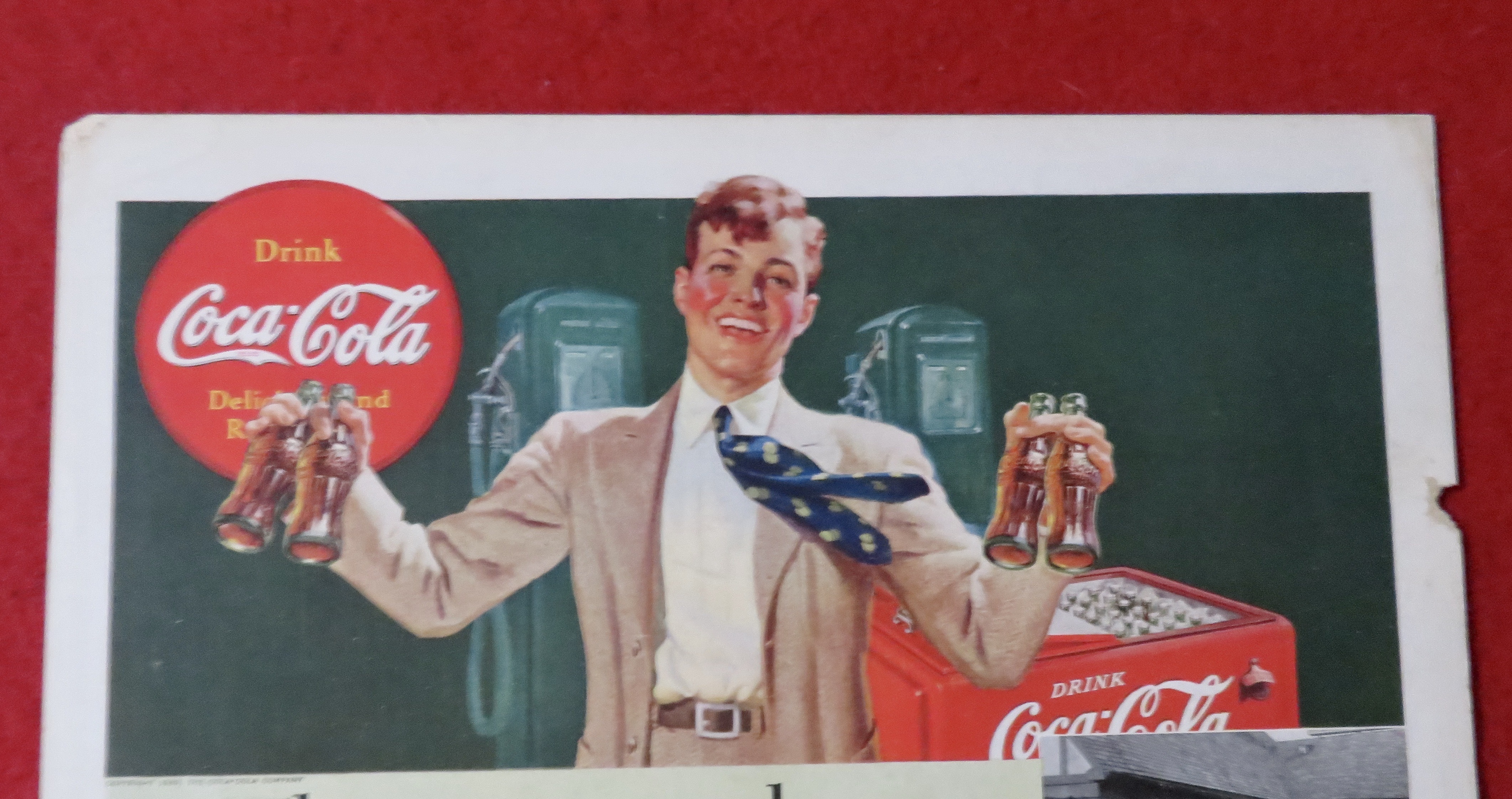1939 Coca Cola (Coke) with Man Holding 4 Bottles
