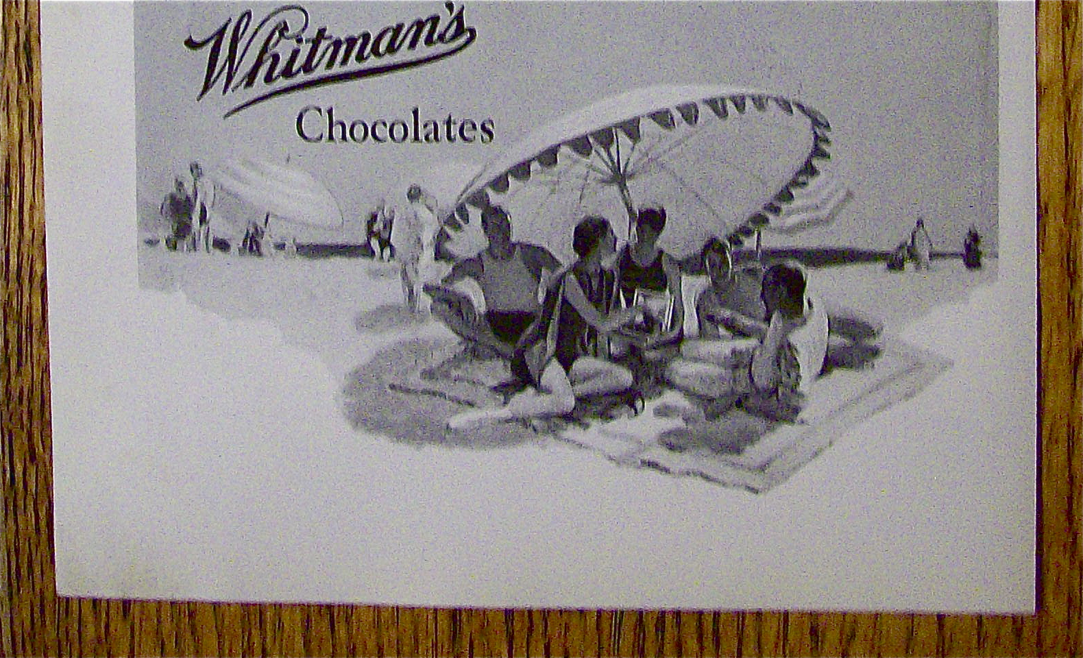 1926 Whitman's Chocolates with People On The Beach