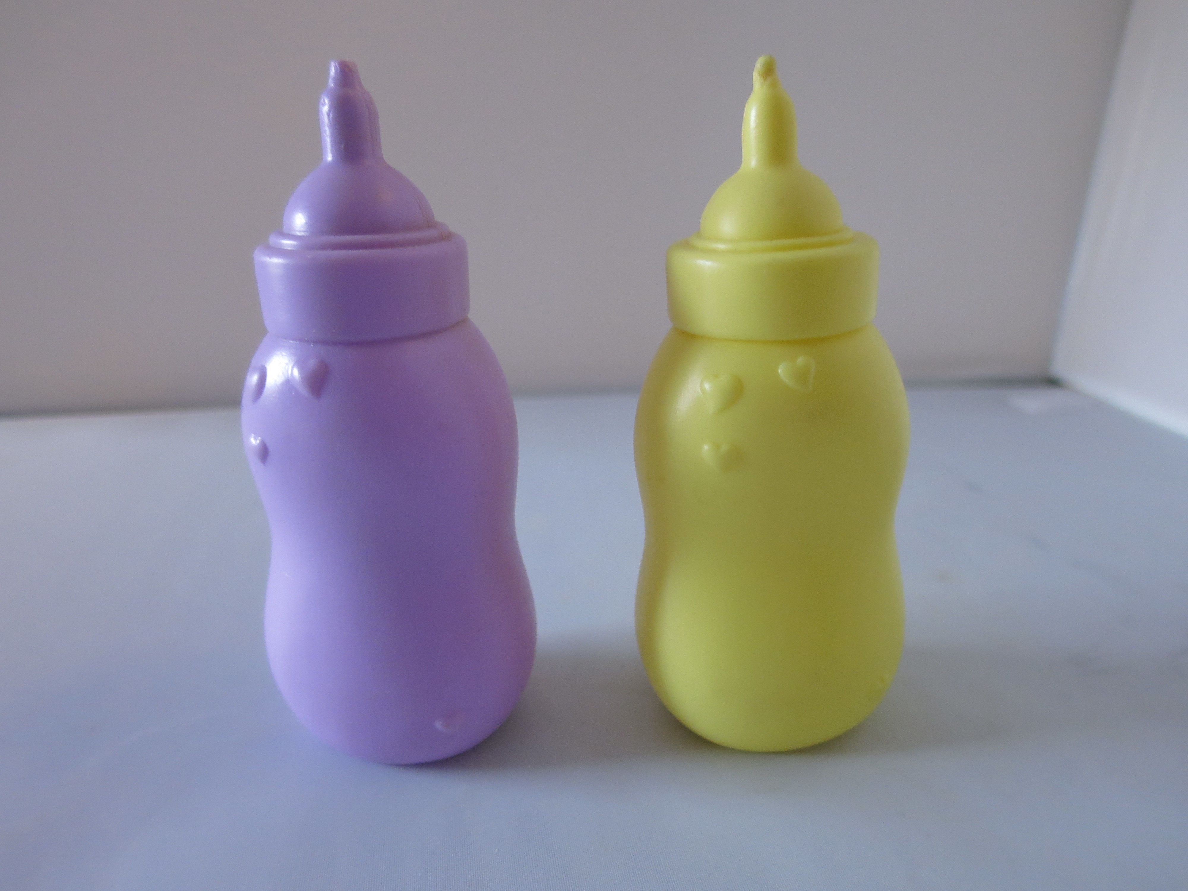 Doll Replacement Bottle lot of two Yellow Heart Purple Heart