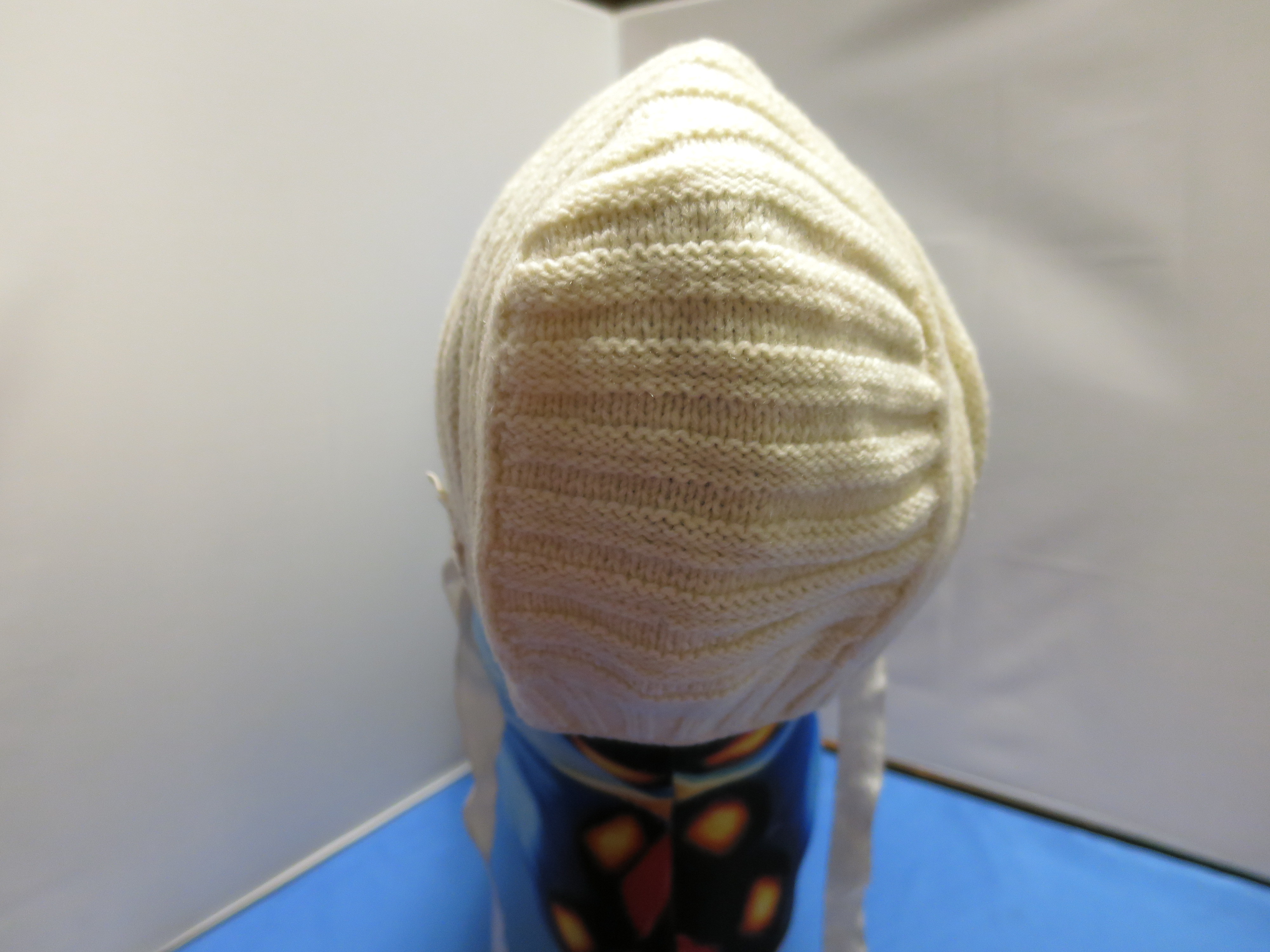 Baby Bonnet Hand knit white corded with satin ties