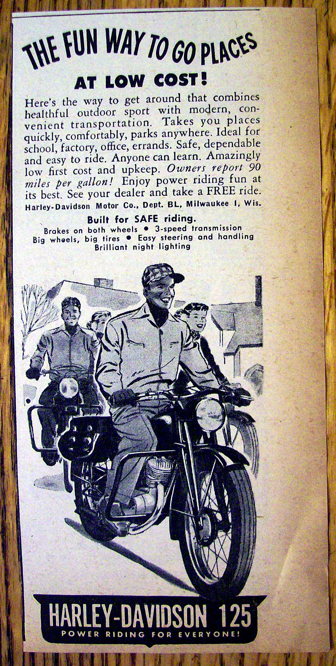 1949 Harley Davidson 125 Motorcycle with Man Riding