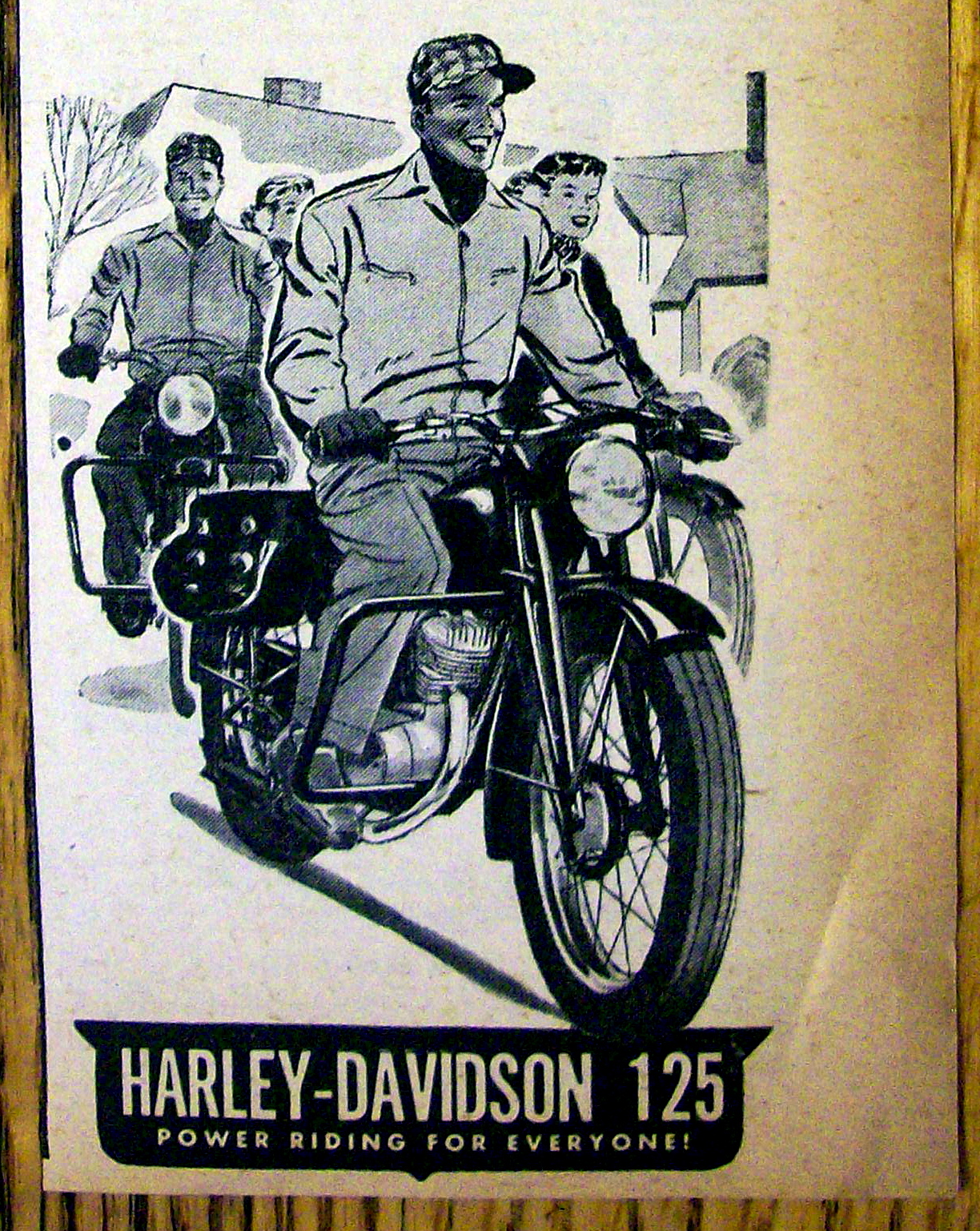 1949 Harley Davidson 125 Motorcycle with Man Riding