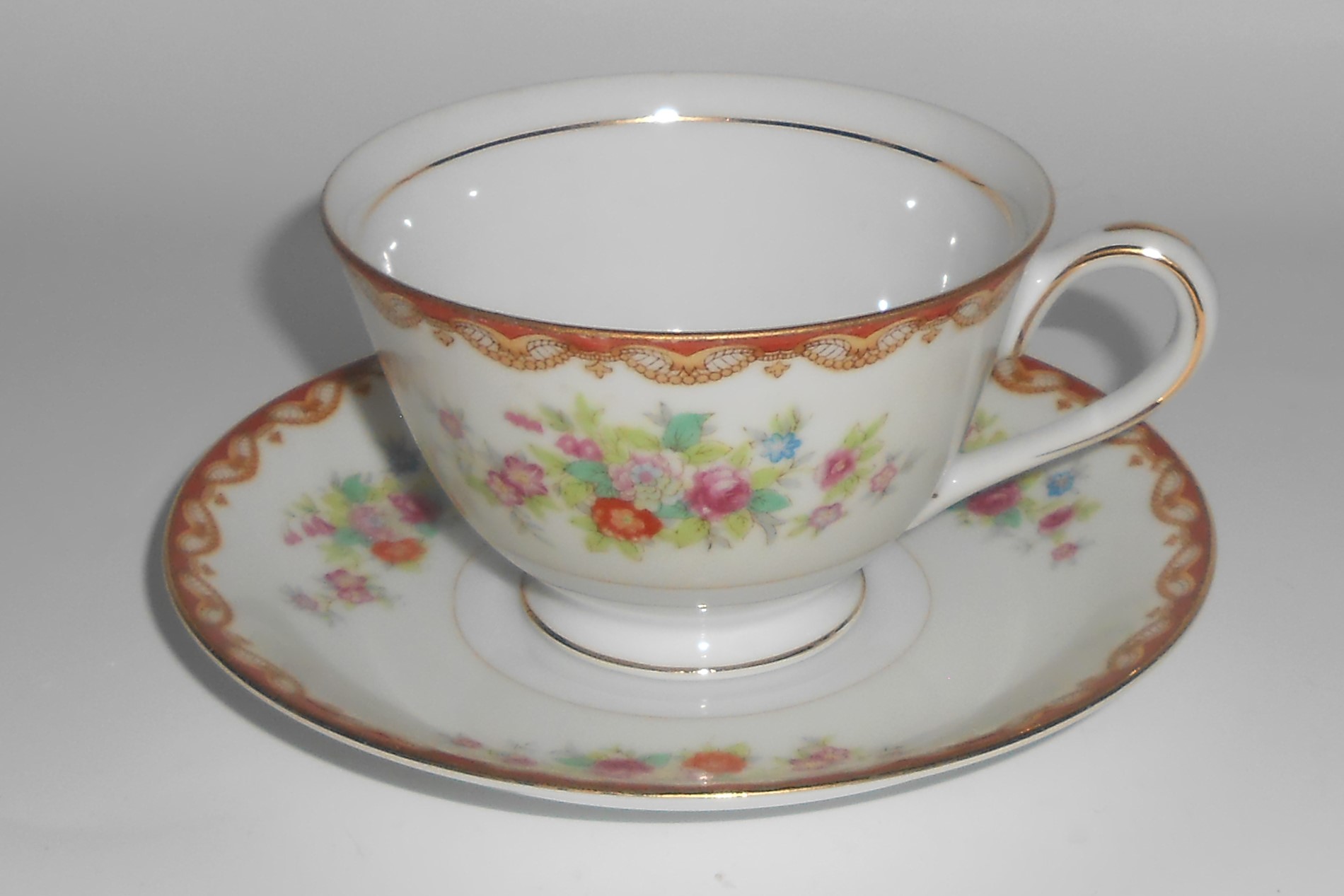 Diamond Porcelain China Roslyn w/Gold Cup & Saucer