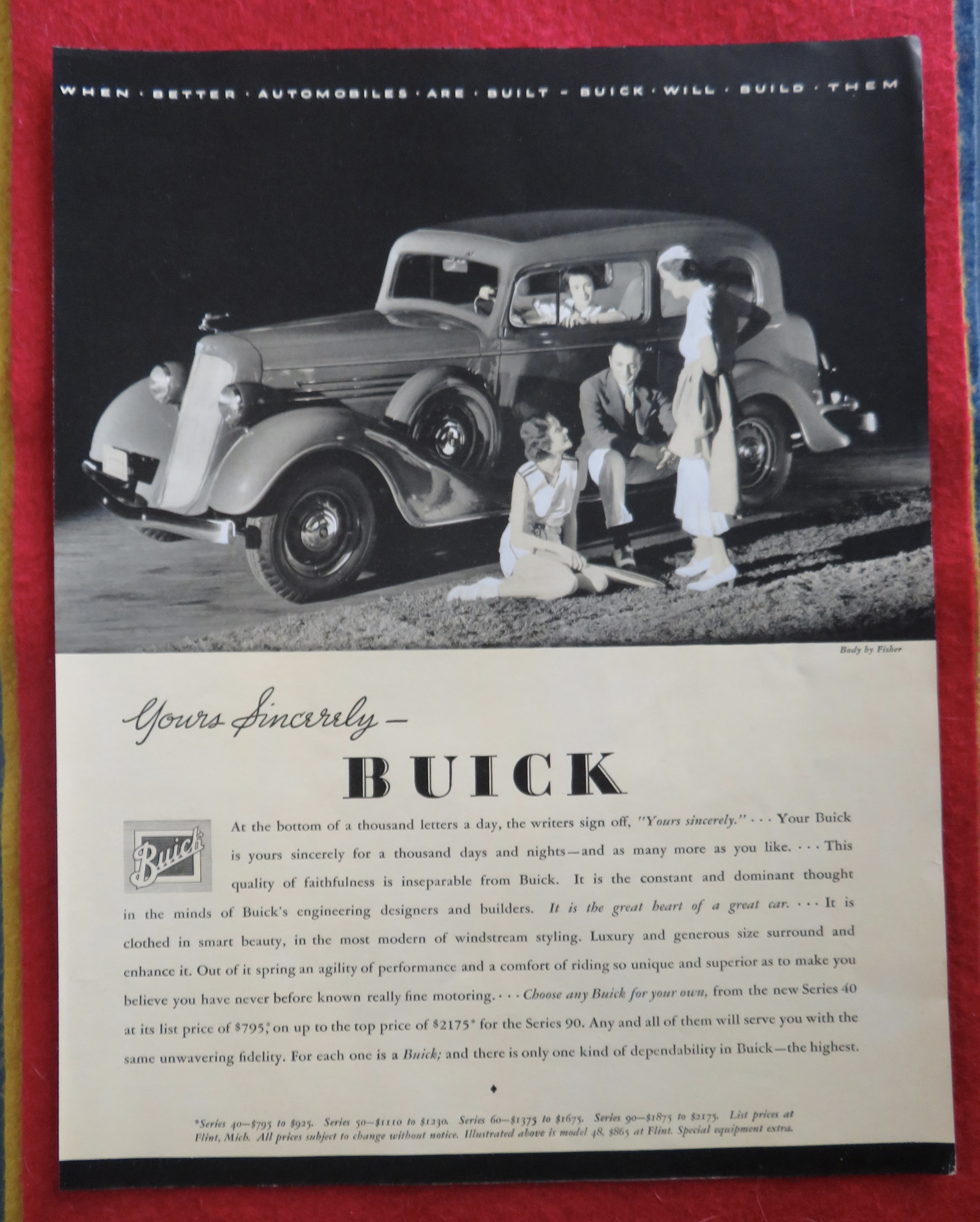 1934 Buick Automobile with People Sitting Around Car