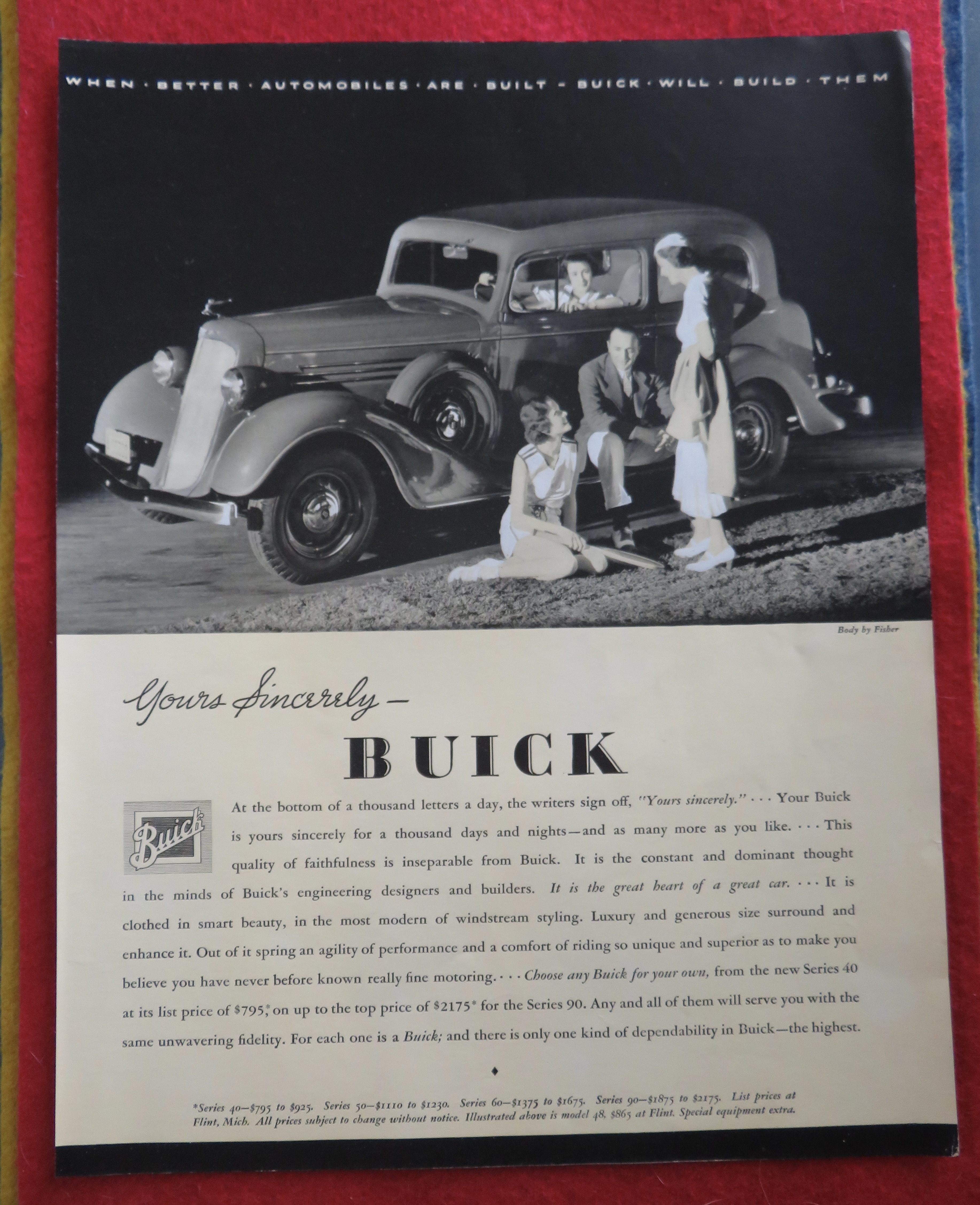1934 Buick Automobile with People Sitting Around Car