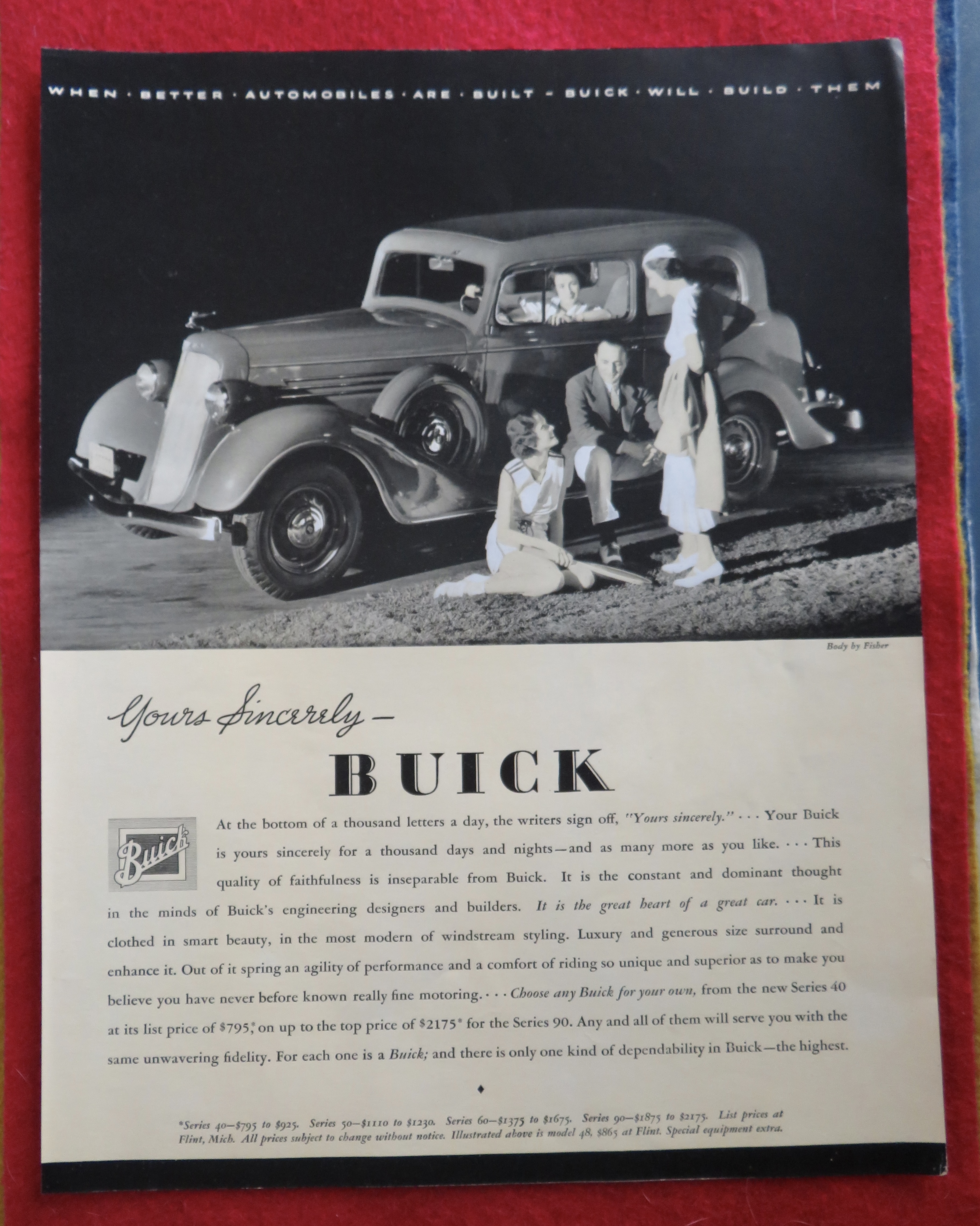 1934 Buick Automobile with People Sitting Around Car