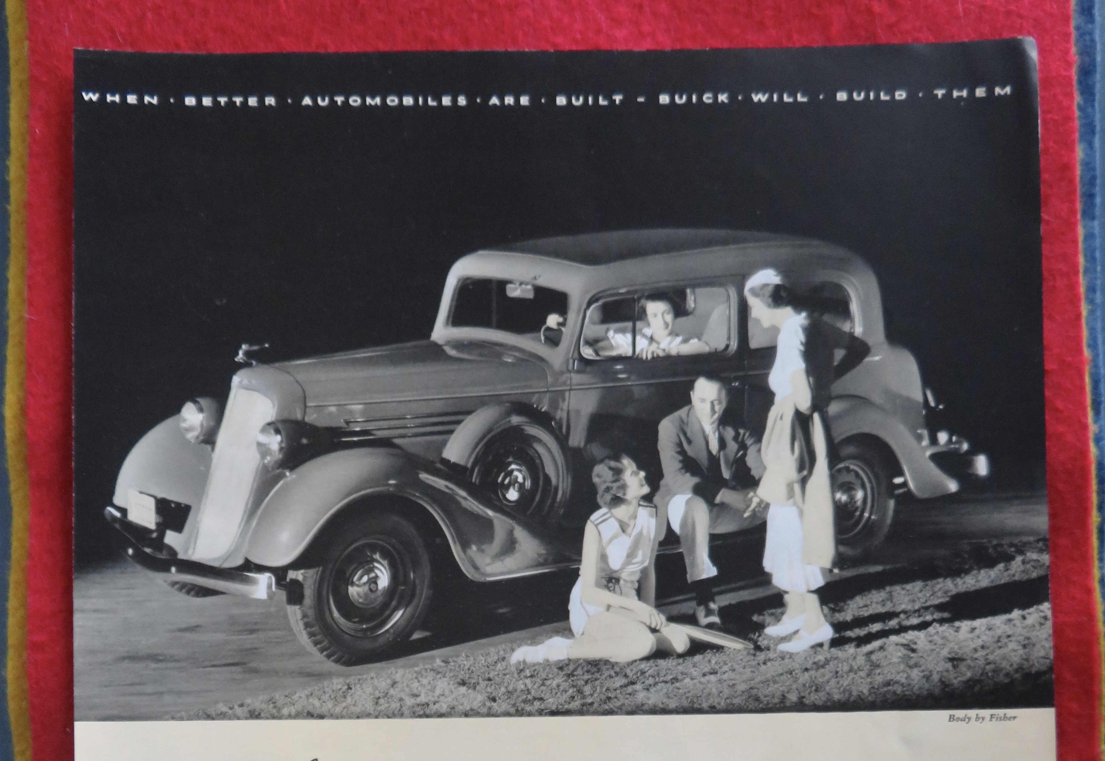 1934 Buick Automobile with People Sitting Around Car