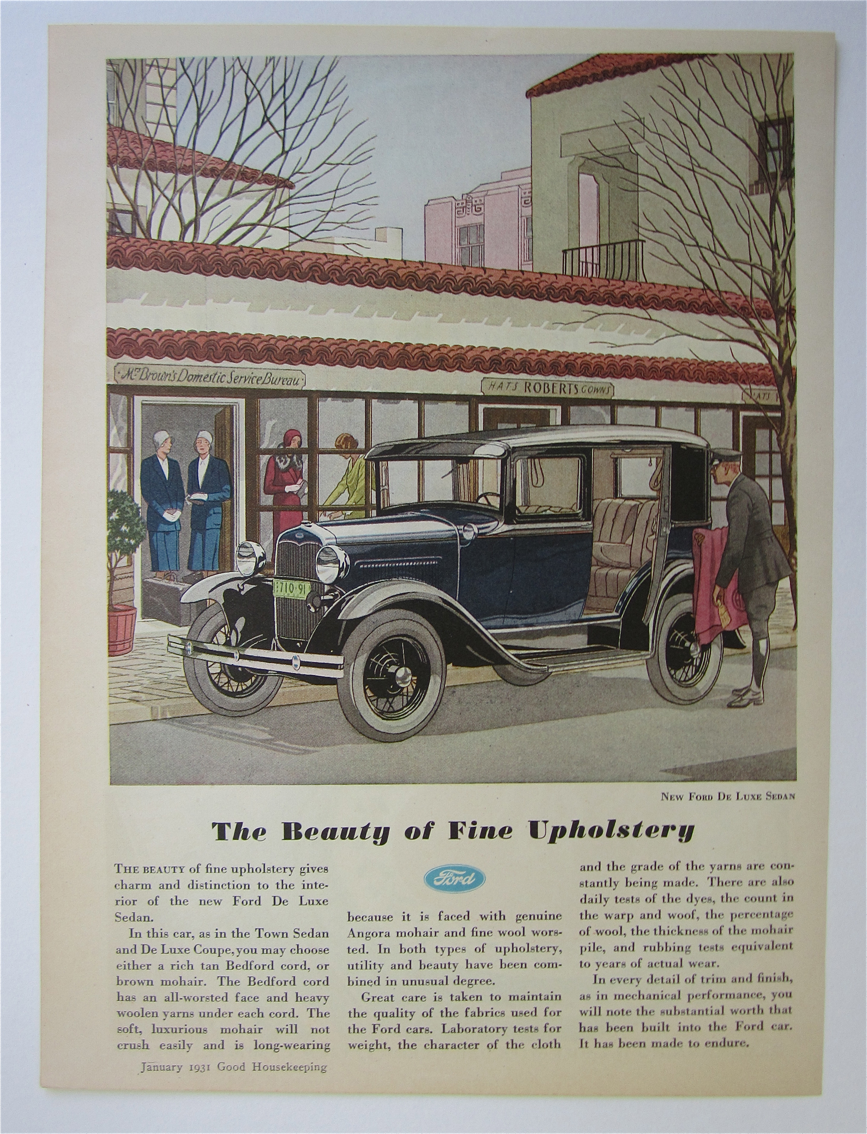 1931 Ford with the New Ford De Luxe Sedan
