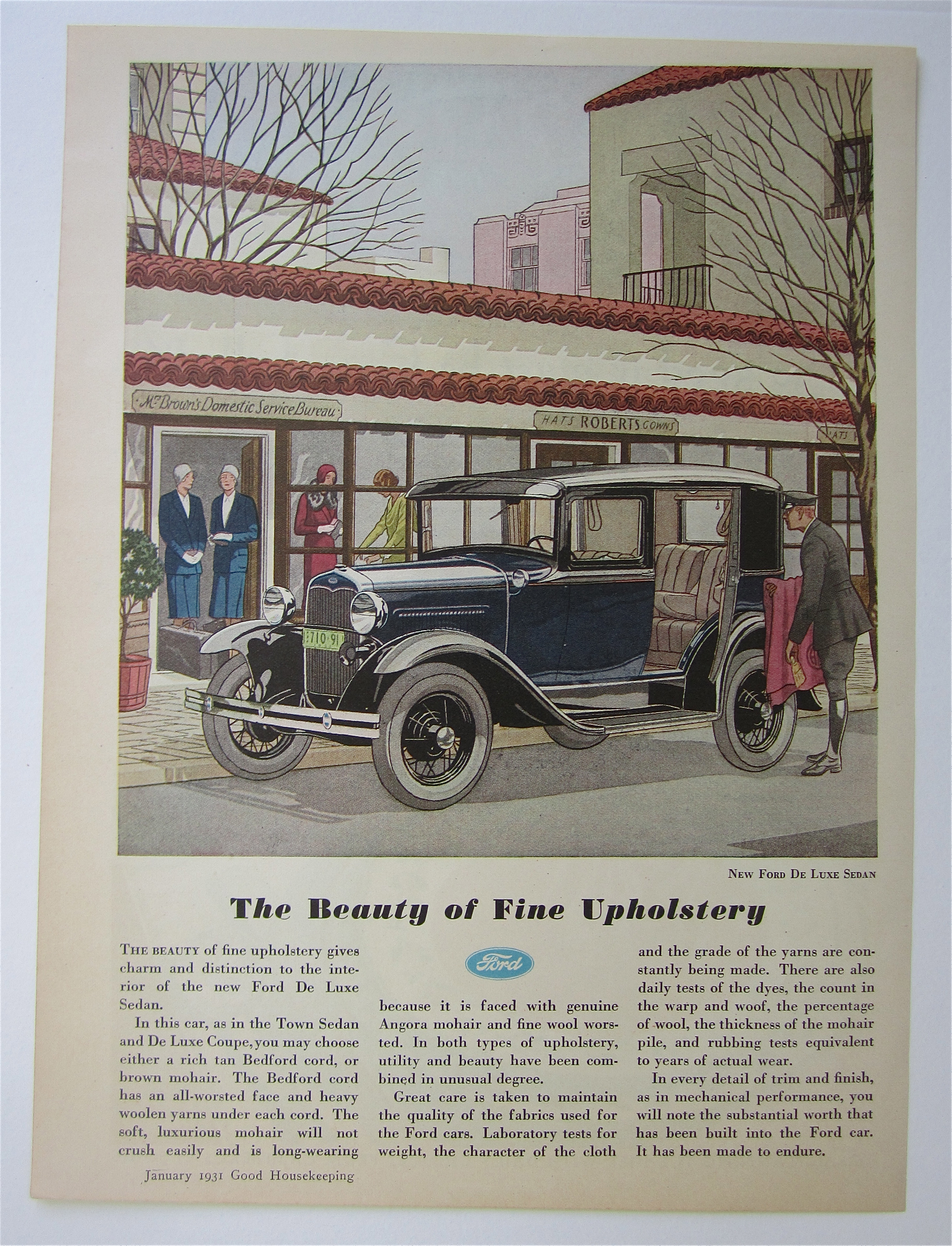 1931 Ford with the New Ford De Luxe Sedan