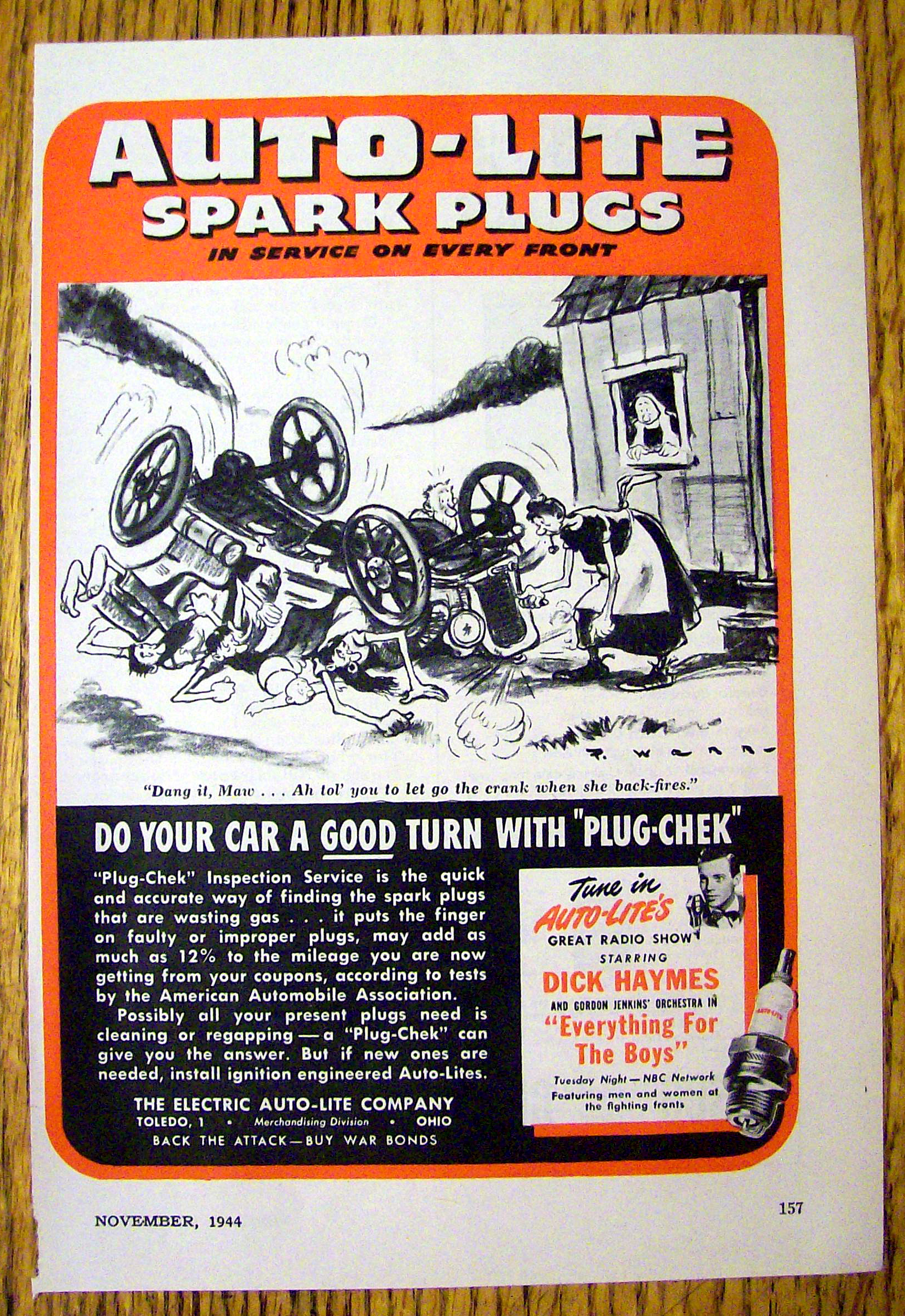 1944 Auto Lite Spark Plugs with Woman & Wrecked Car