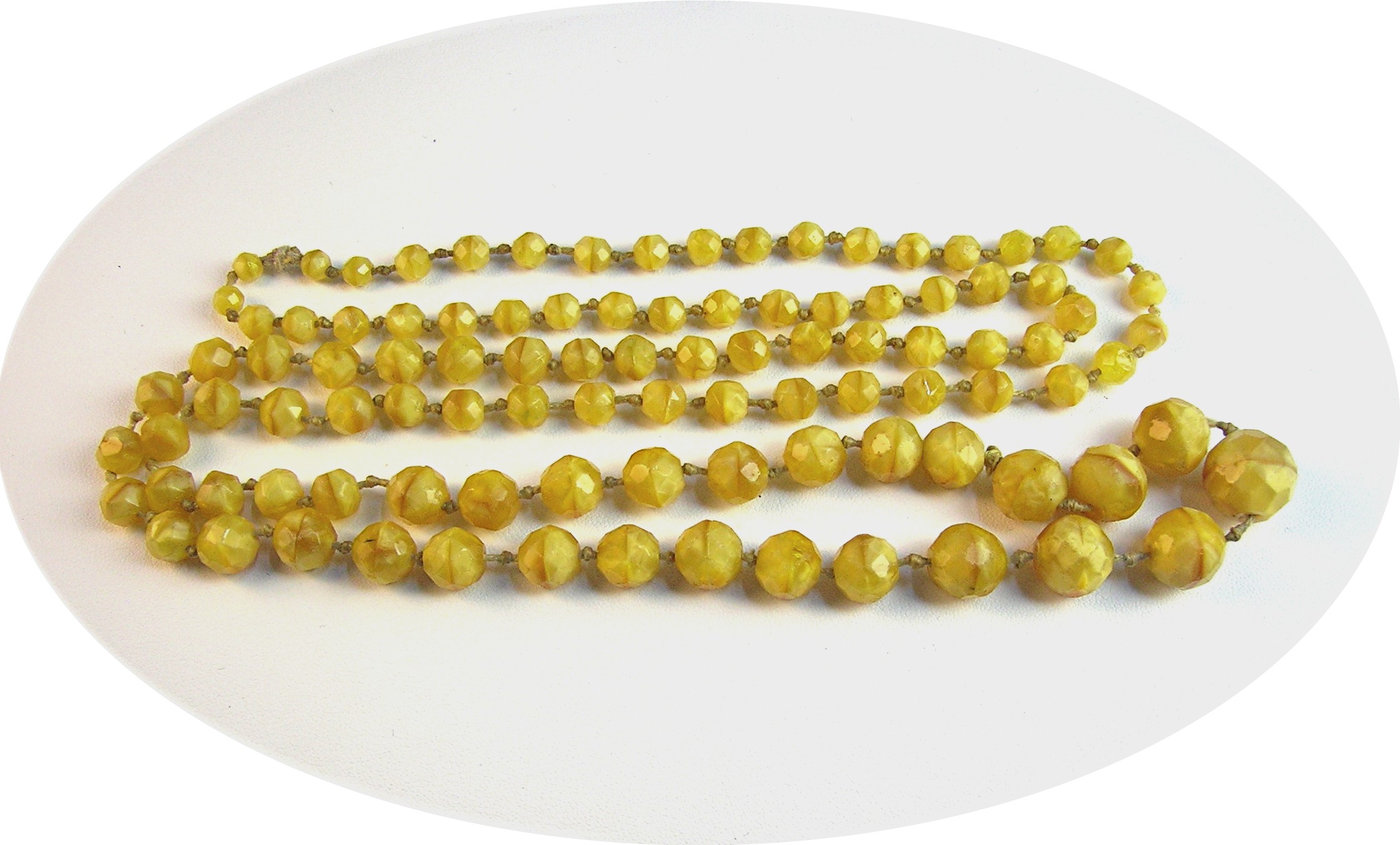 Antique Glass Hand Knotted Butterscotch Glass Beads.