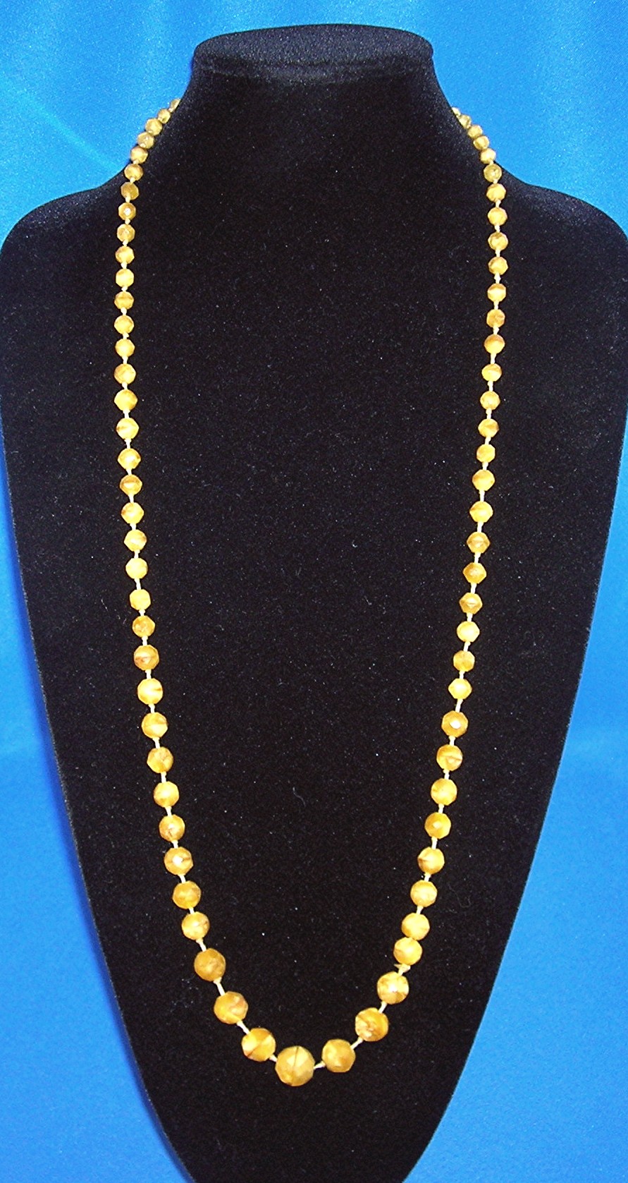 Antique Glass Hand Knotted Butterscotch Glass Beads.