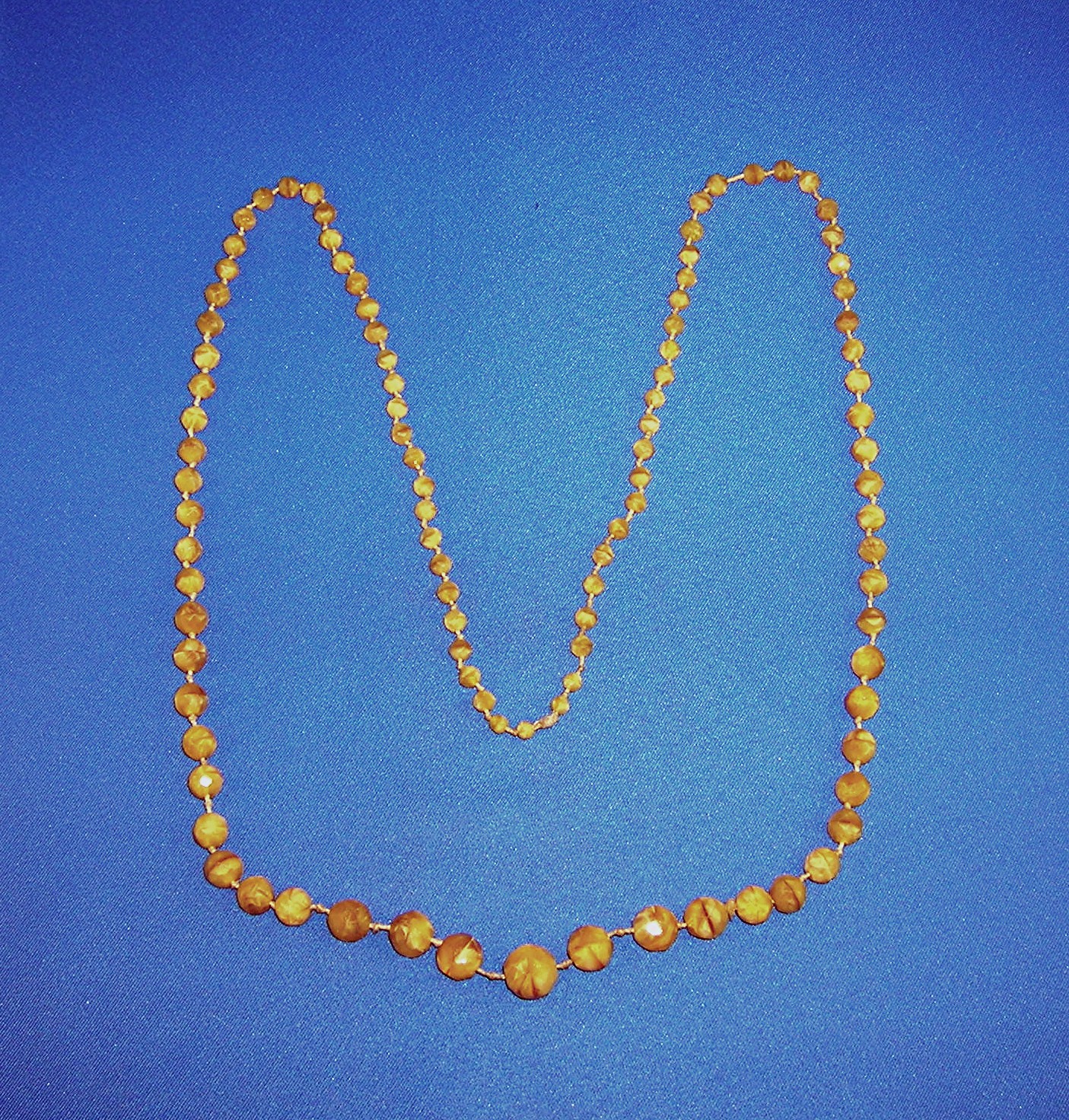 Antique Glass Hand Knotted Butterscotch Glass Beads.