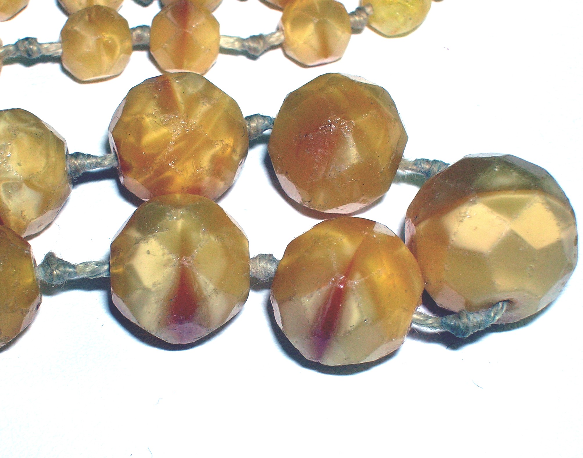 Antique Glass Hand Knotted Butterscotch Glass Beads.