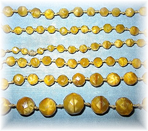 Antique Glass Hand Knotted Butterscotch Glass Beads.