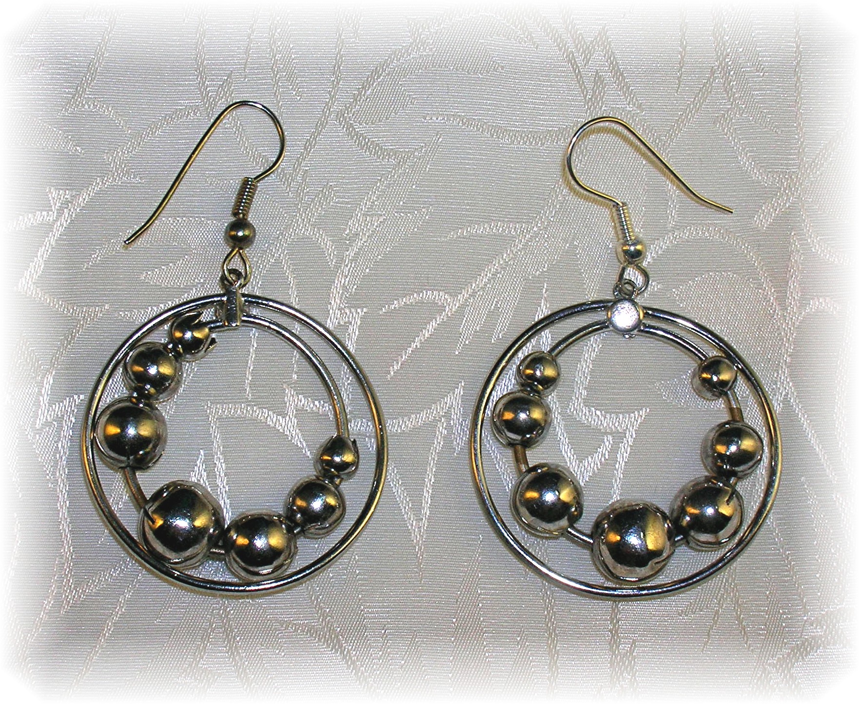 Silver Dangle Earrings Moving Ball Loops