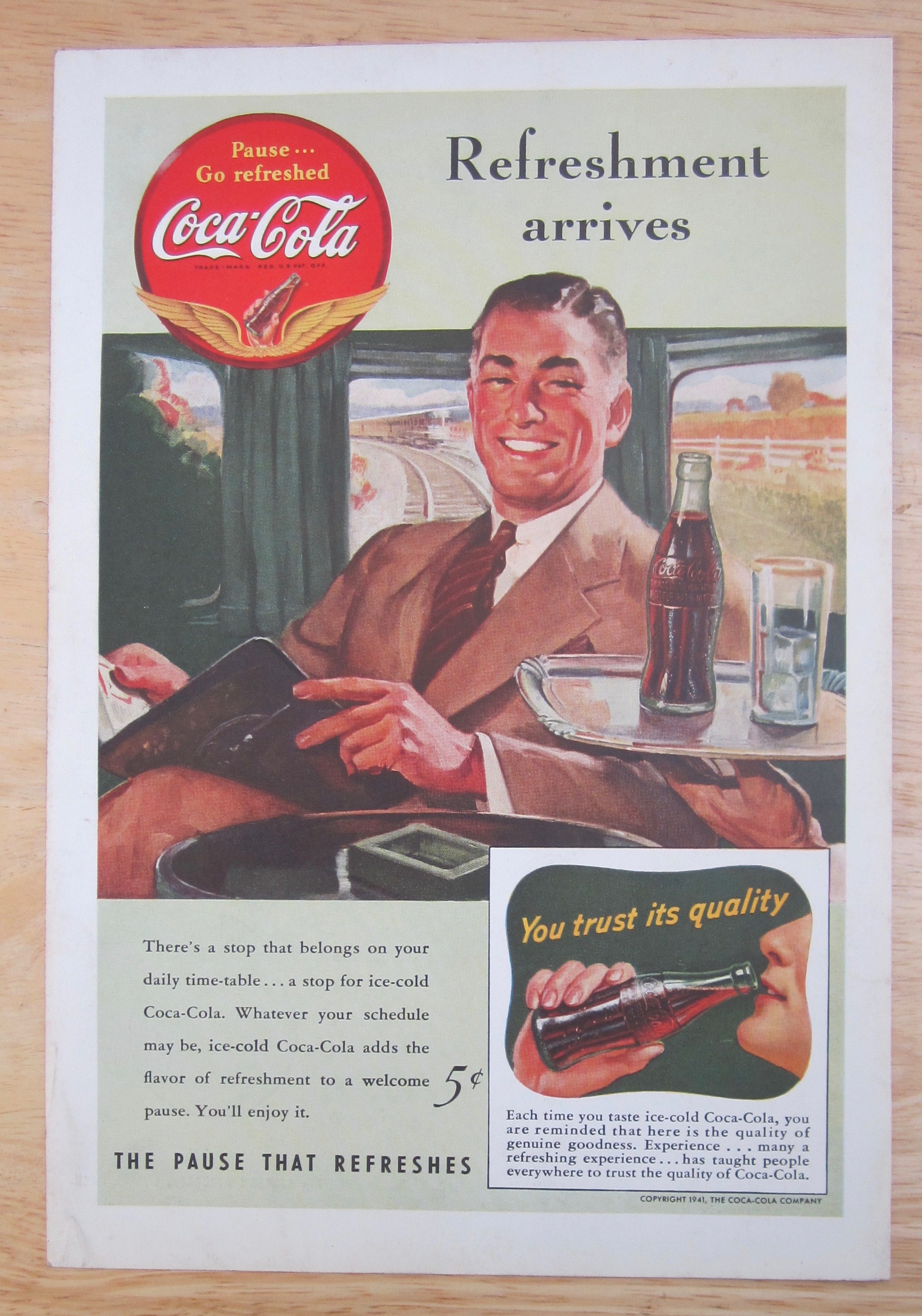 1941 Coca Cola w/Man Sitting on a Train Enjoying a Coke